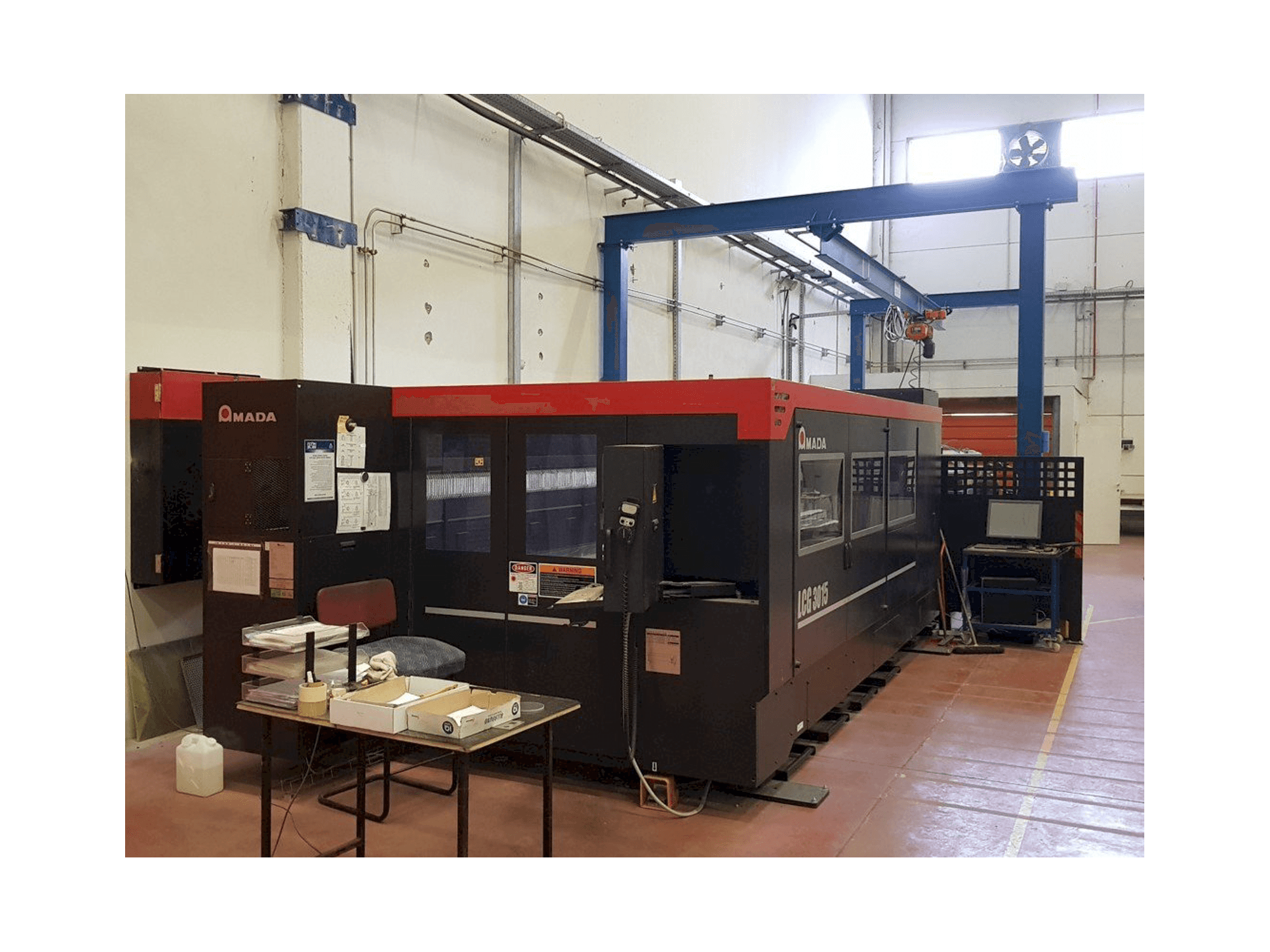 Front view of AMADA Lcg 3015 machine