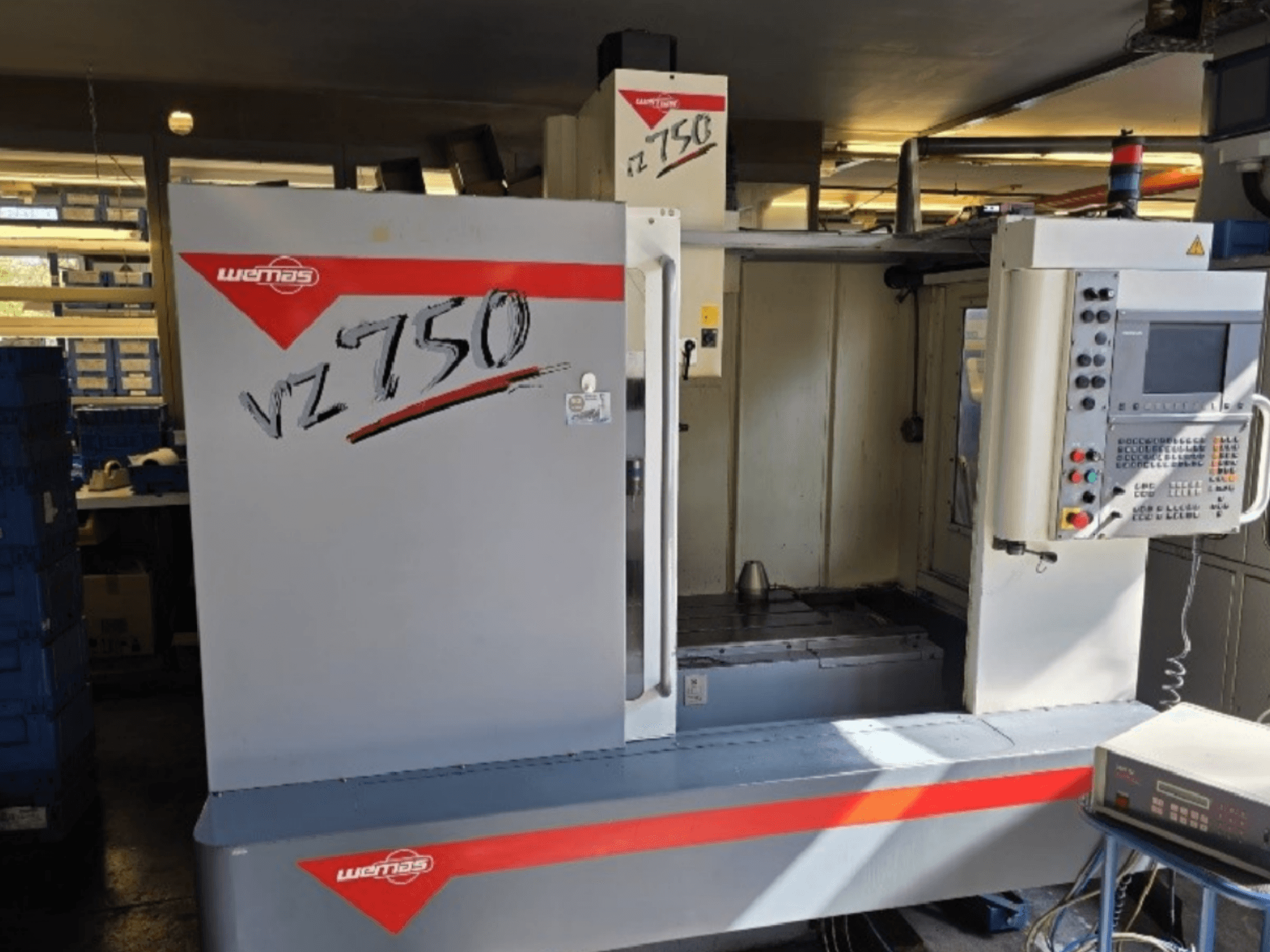 WEMAS VZ 750 CENTURY vertical machining center, front view showcasing control panel and workspace area.