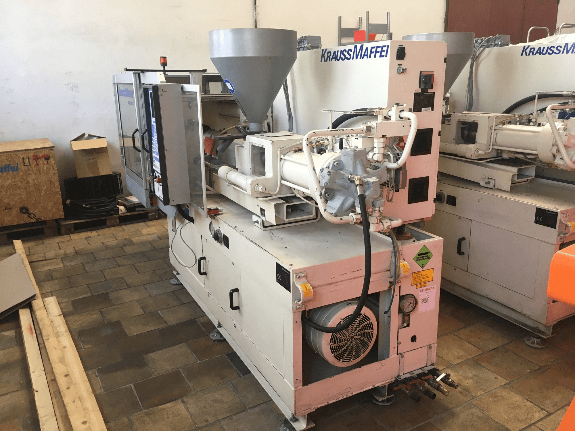 Left side view of Krauss Maffei 80/390 C2 machine