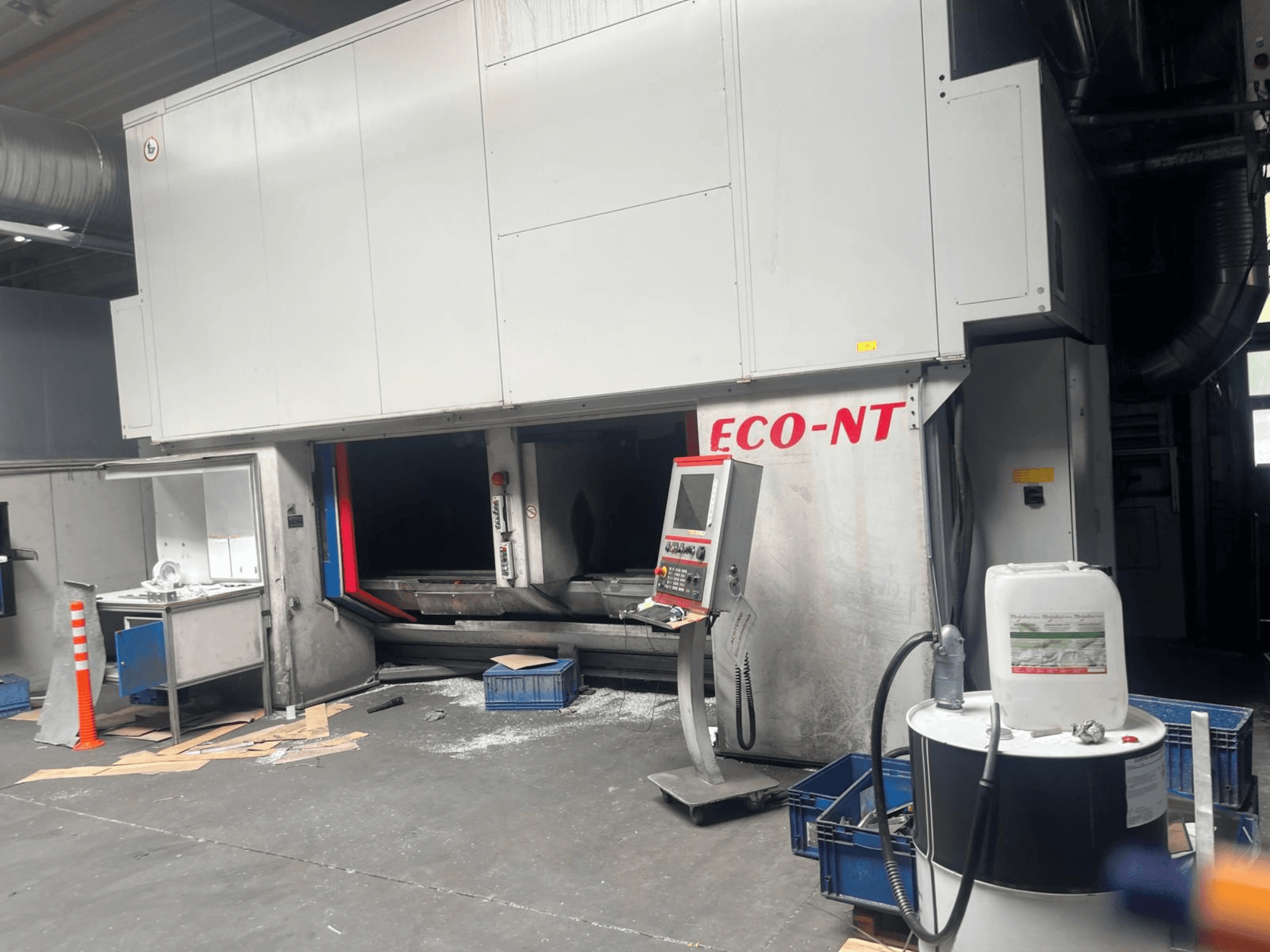 Front view of the Hamuel Reichenbacher ECO-NT vertical machining centre, showing operator panel, coolant tank, and workspace.