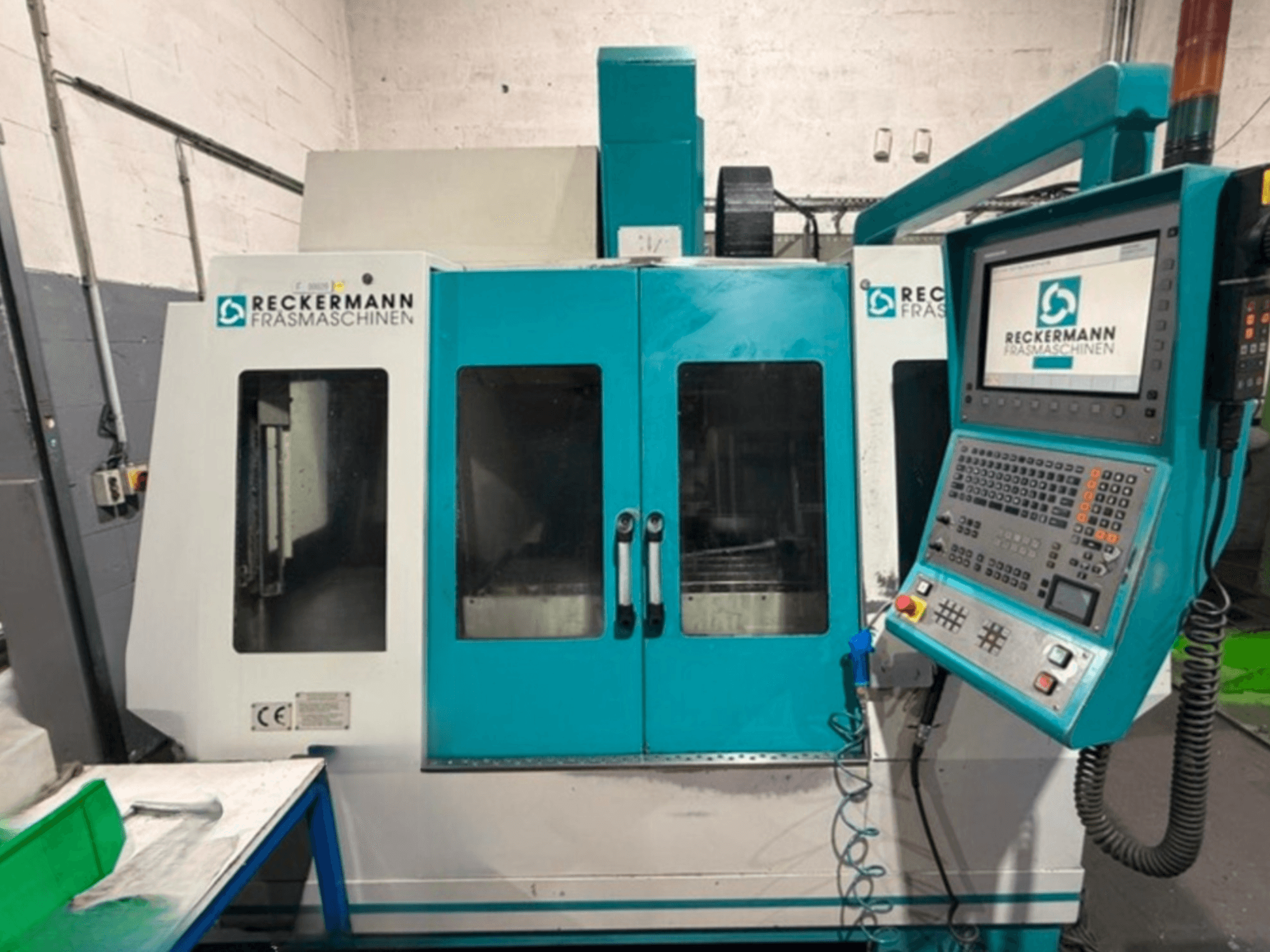 RECKERMANN RBZ 1050 Universal Machining Centre, front view, featuring control panel and dual observation windows.