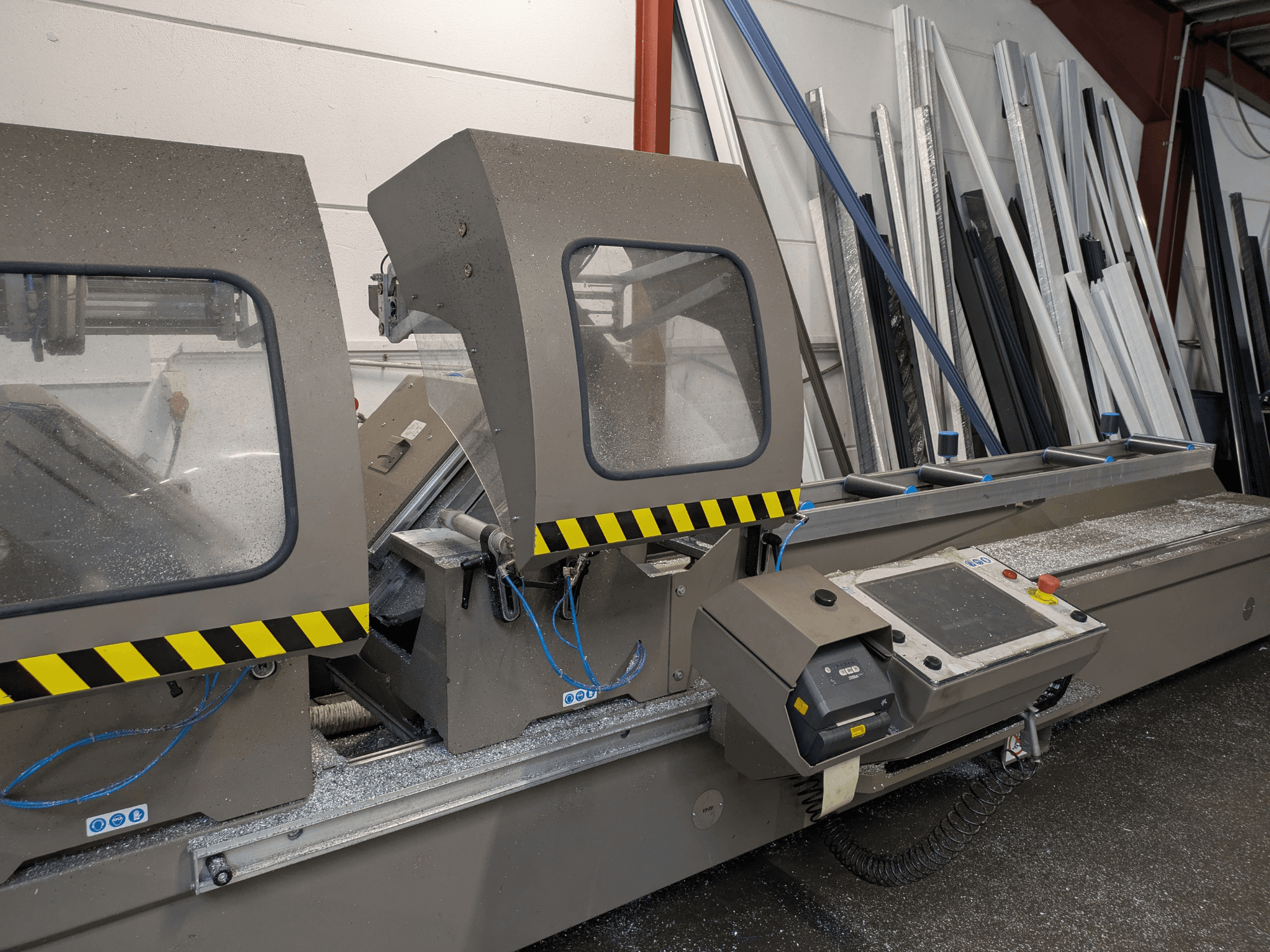 PERTICI 600TSE circular metal saw in front view, featuring safety glass panels and control interface with buttons and wiring.