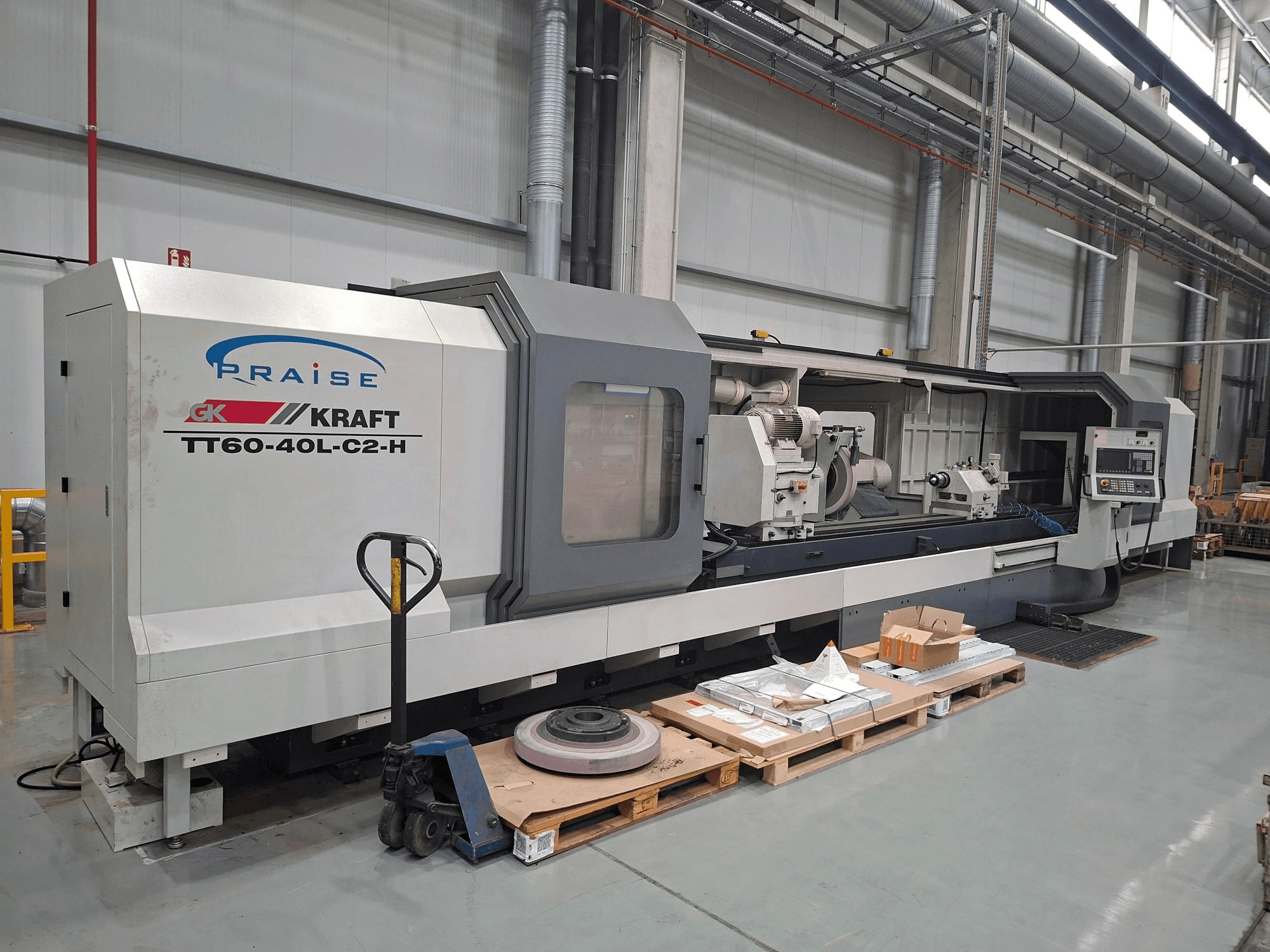 KRAFT TT60-40L-C2-H cylindrical grinding machine, side view, showing controls and grinding wheel in a workshop setting.