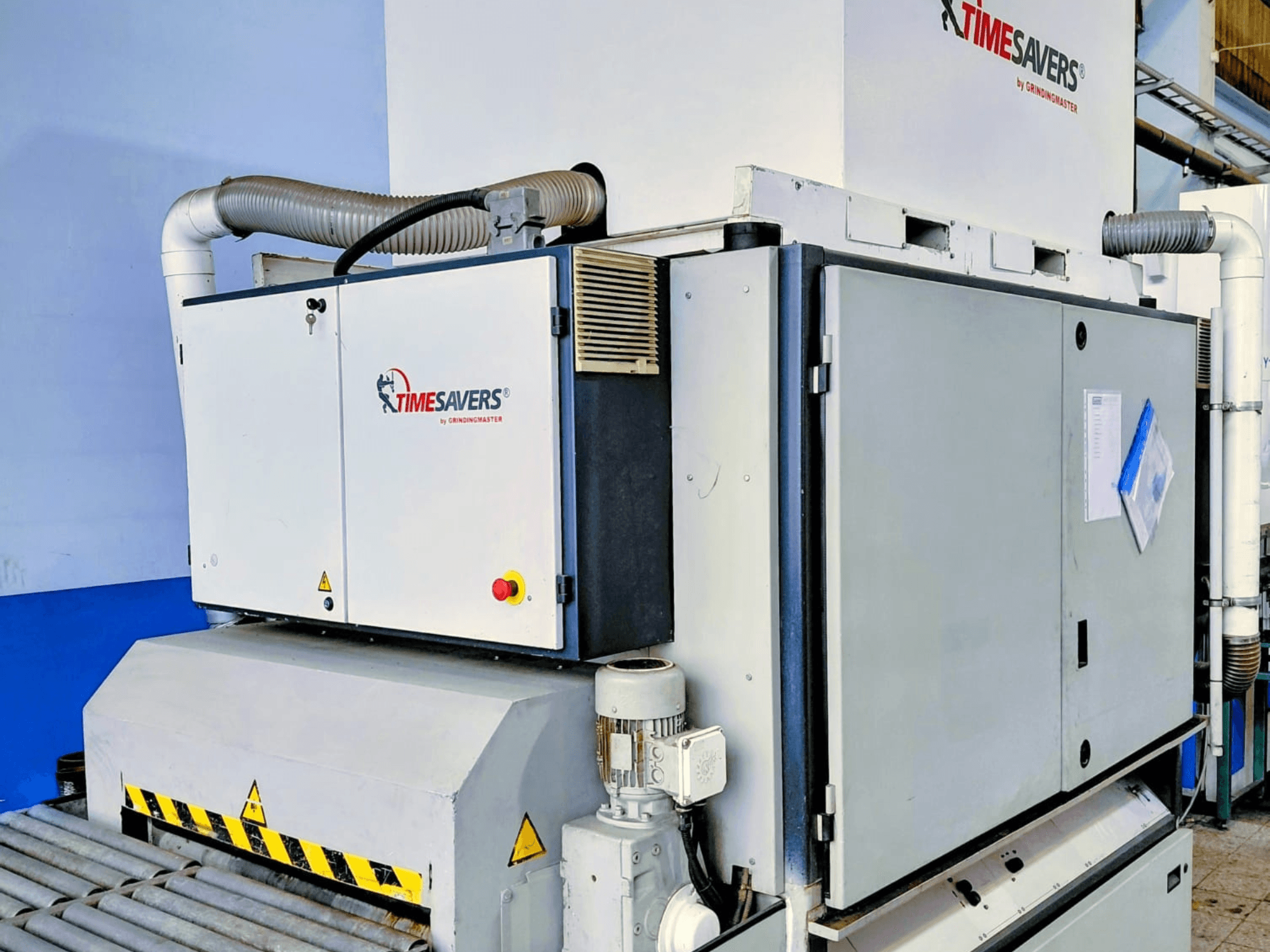 TIME SAVERS industrial sanding machine, side view, features adjustable roller, control panel, and dust extraction system.