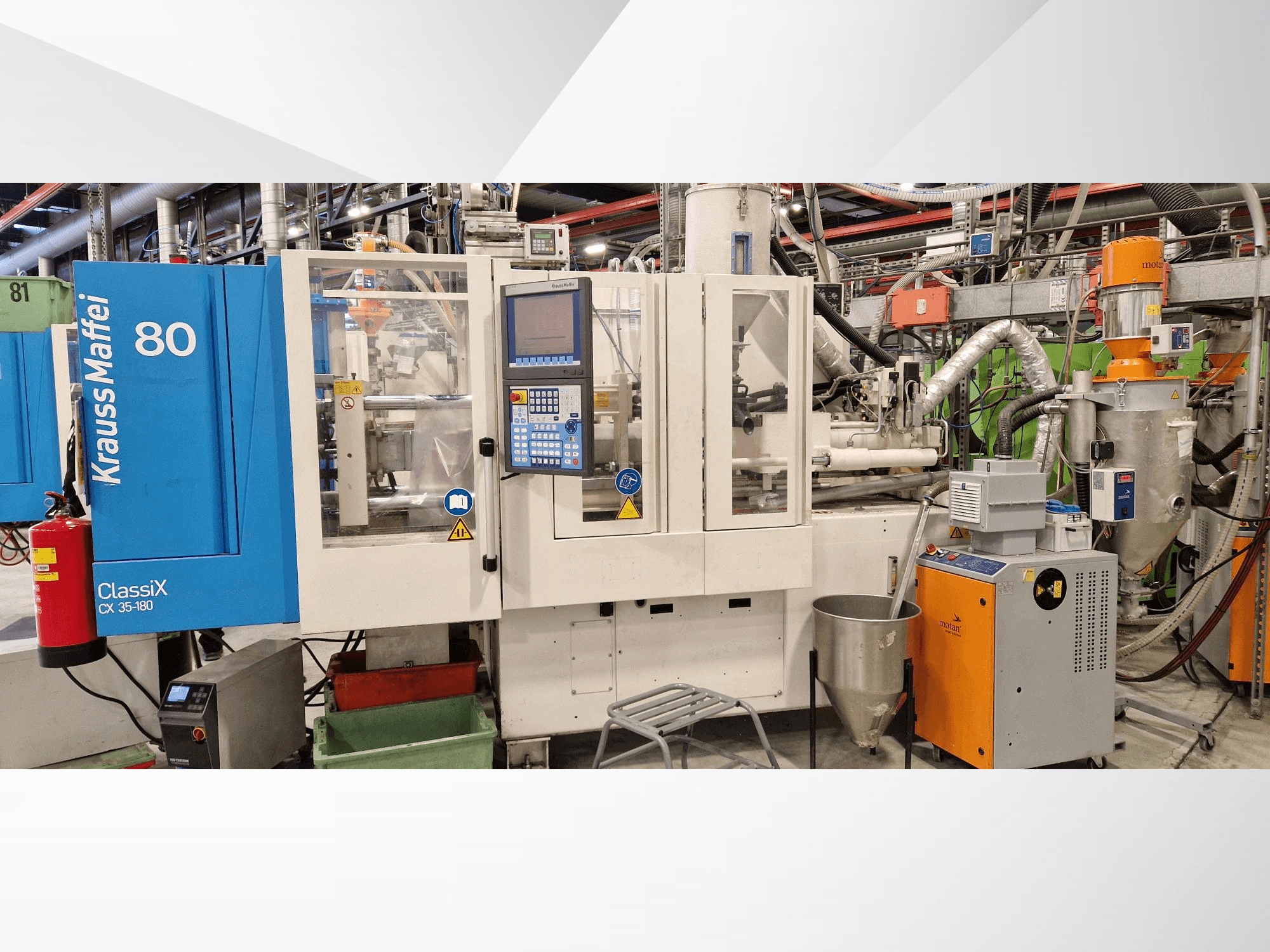 Krauss Maffei ClassiX CX 35-180 hydraulic injection moulding machine, front view, with control panel and auxiliary equipment visible.