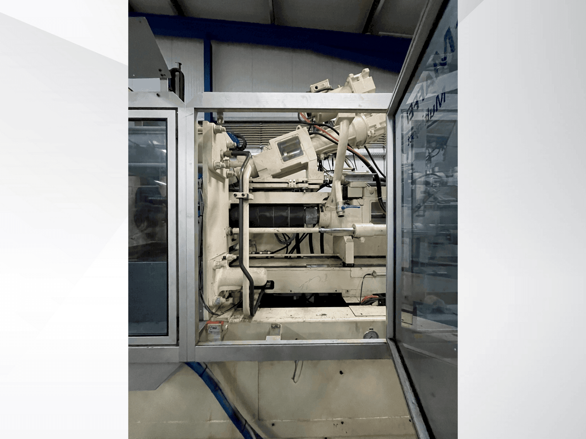 Front view of Krauss Maffei 300-1400-390-3-CZ machine