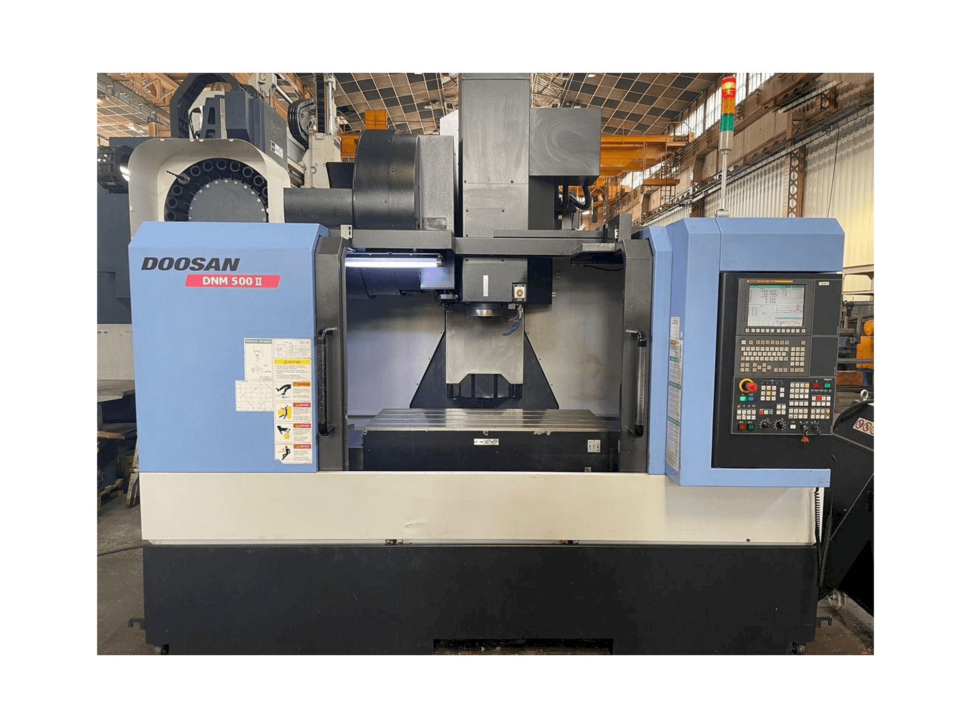 Front view of Doosan MYNX DNM 500 II machine