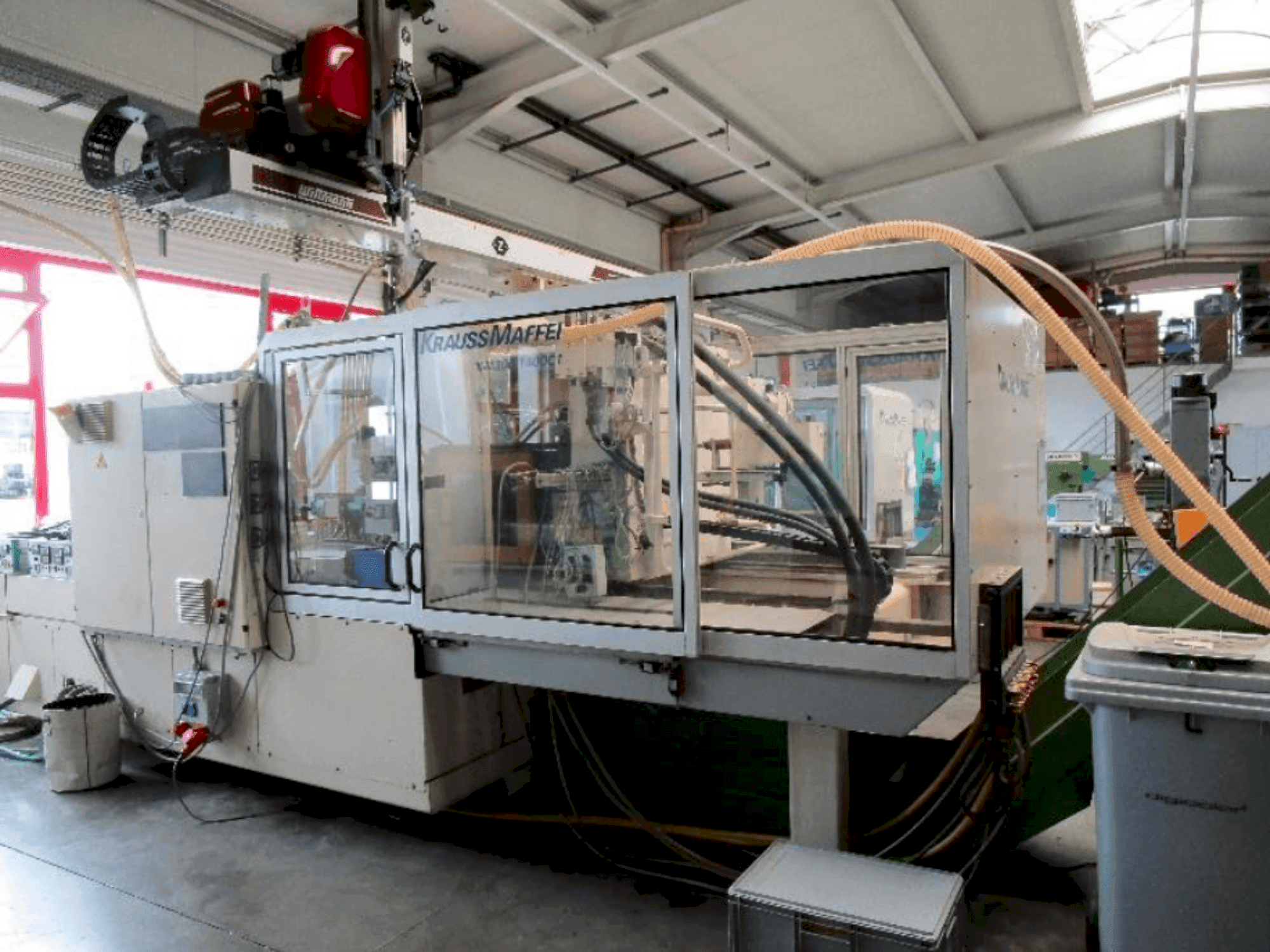 Front view of Krauss Maffei 300-1400 C1 machine