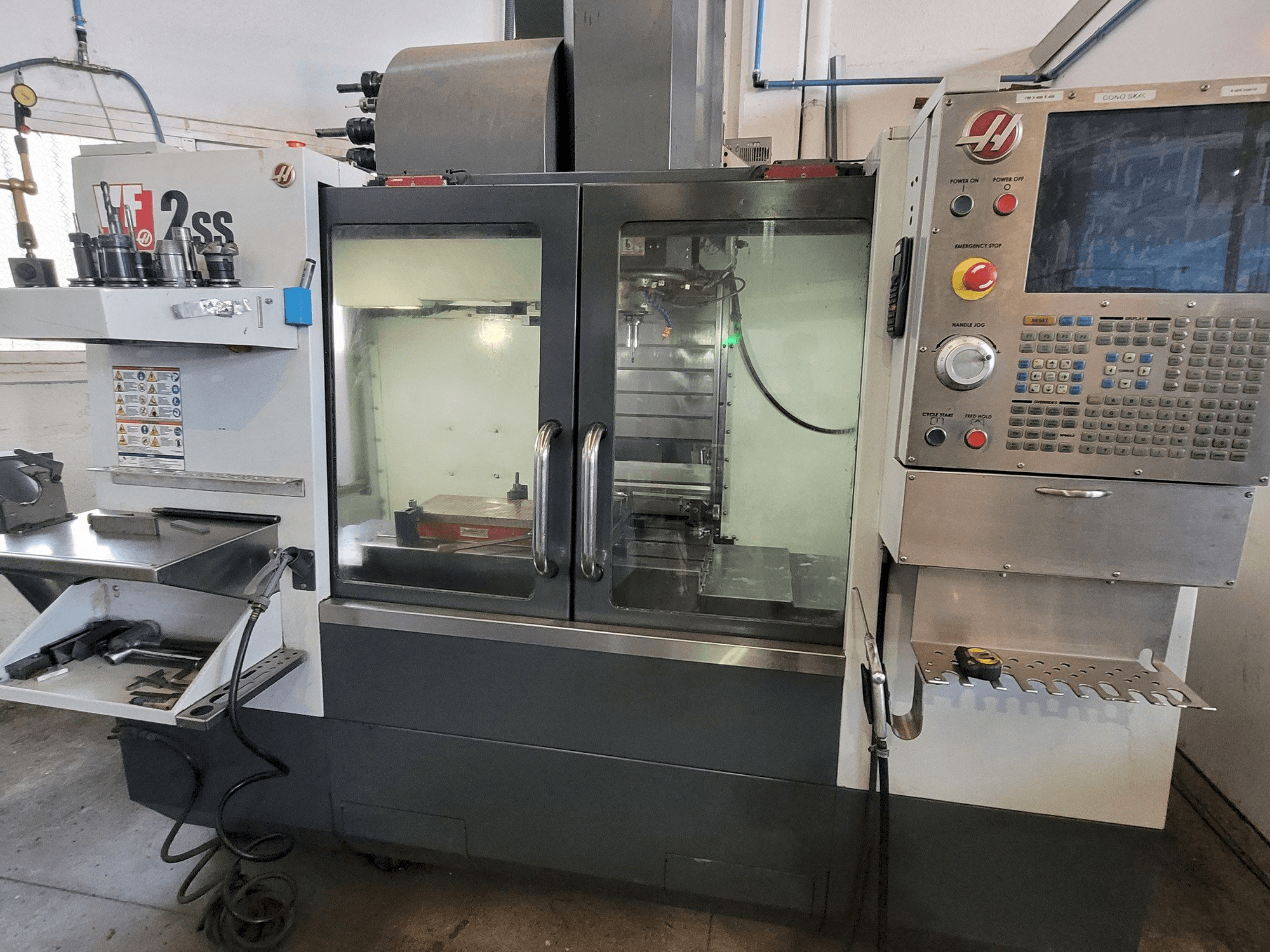 Front view of HAAS VF2SS machine
