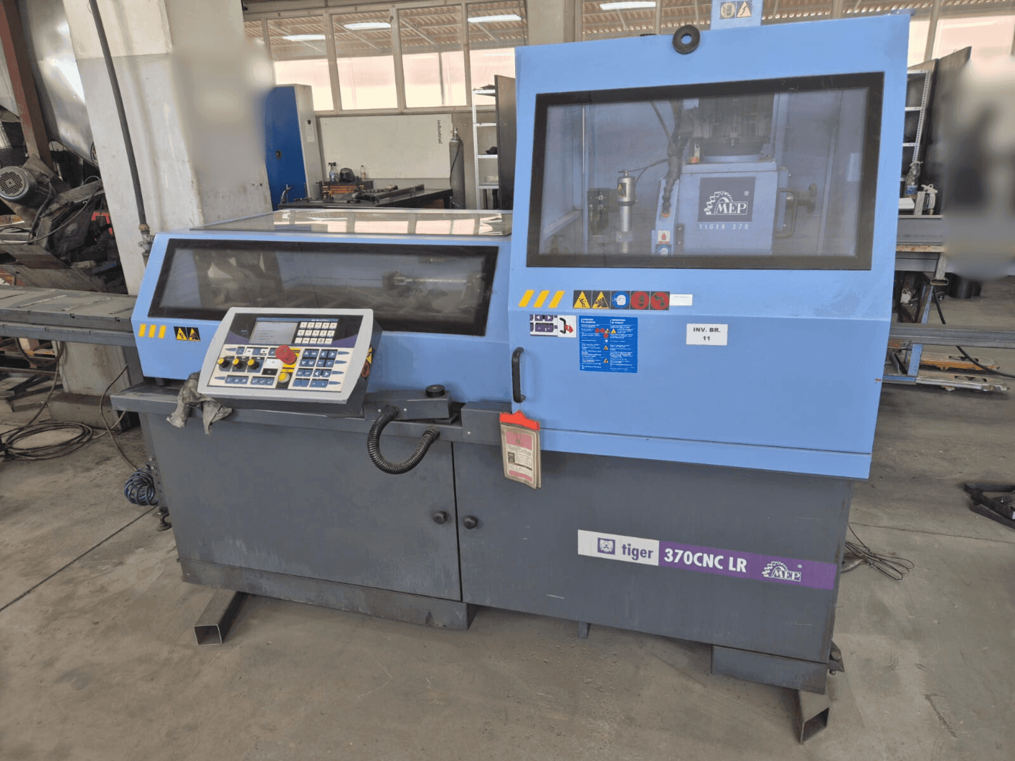 Front view of MEP Tiger 370 CNC machine