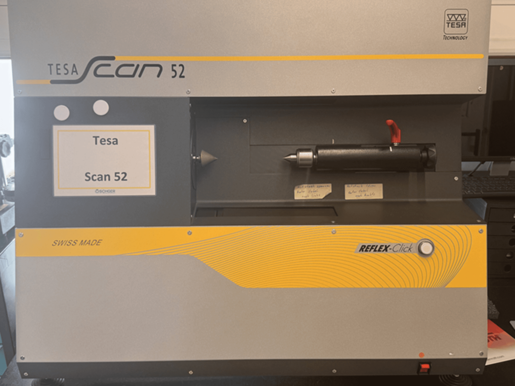 Front view of TESA Scan 52 optical measurement machine with control buttons and "SWISS MADE" label visible.