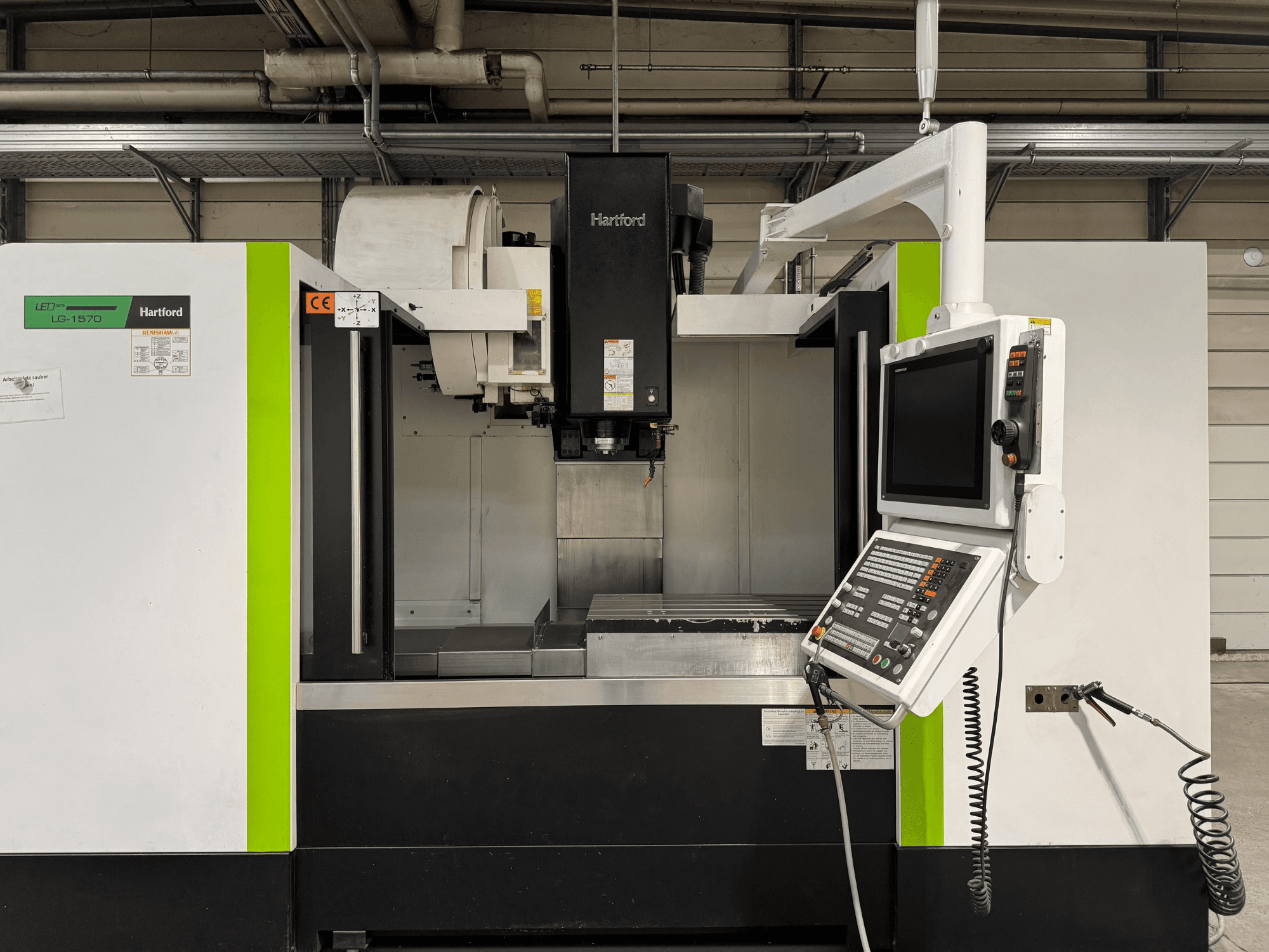 Hartford LG 1570 TNC 640 Vertical Machining Centre, front view; features control panel and workspace with metal base.