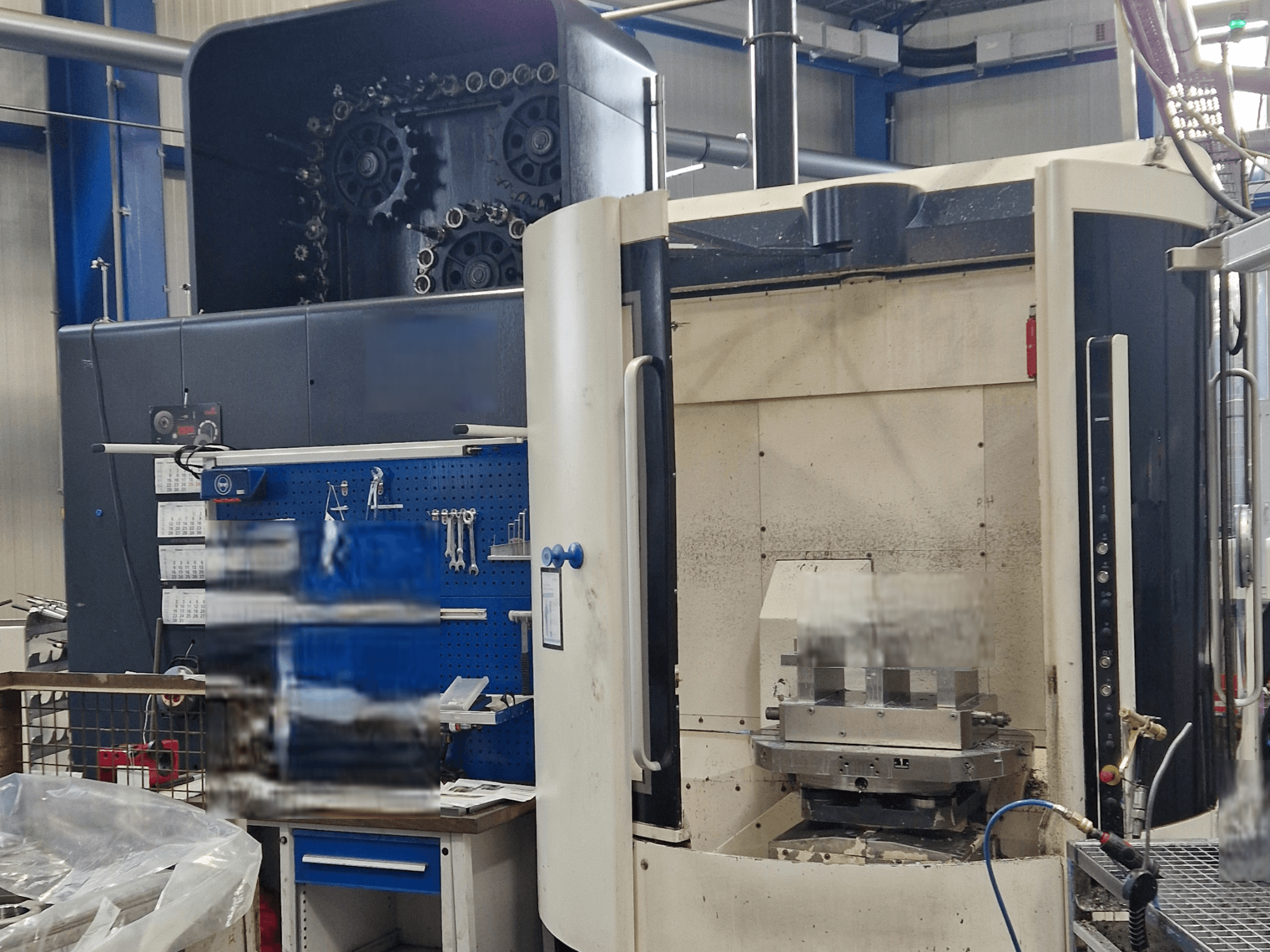 DMG DMC80U DuoBlock Universal Machining Centre, front view, showcasing control panel and work area with tooling accessories.