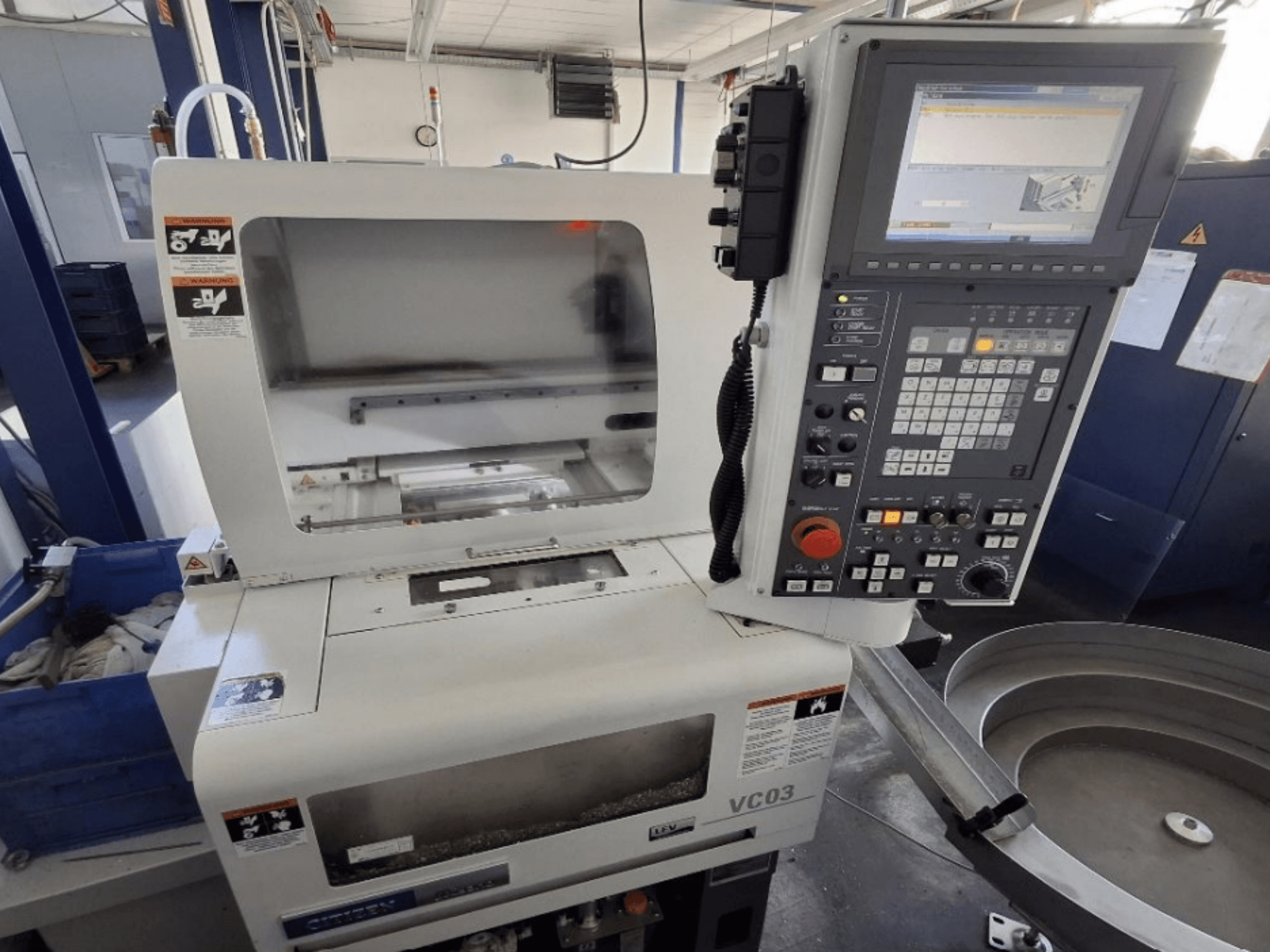 Citizen MIYANO VC-03 horizontal turning machine, front view, displaying control panel and machining area.