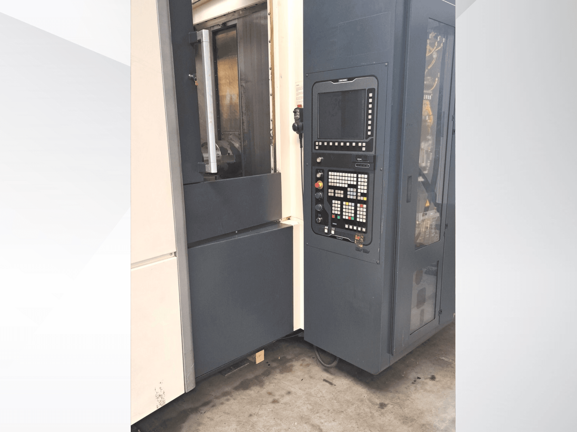 DMG MORI NHX5000 horizontal machining center, side view showing control panel and access door.