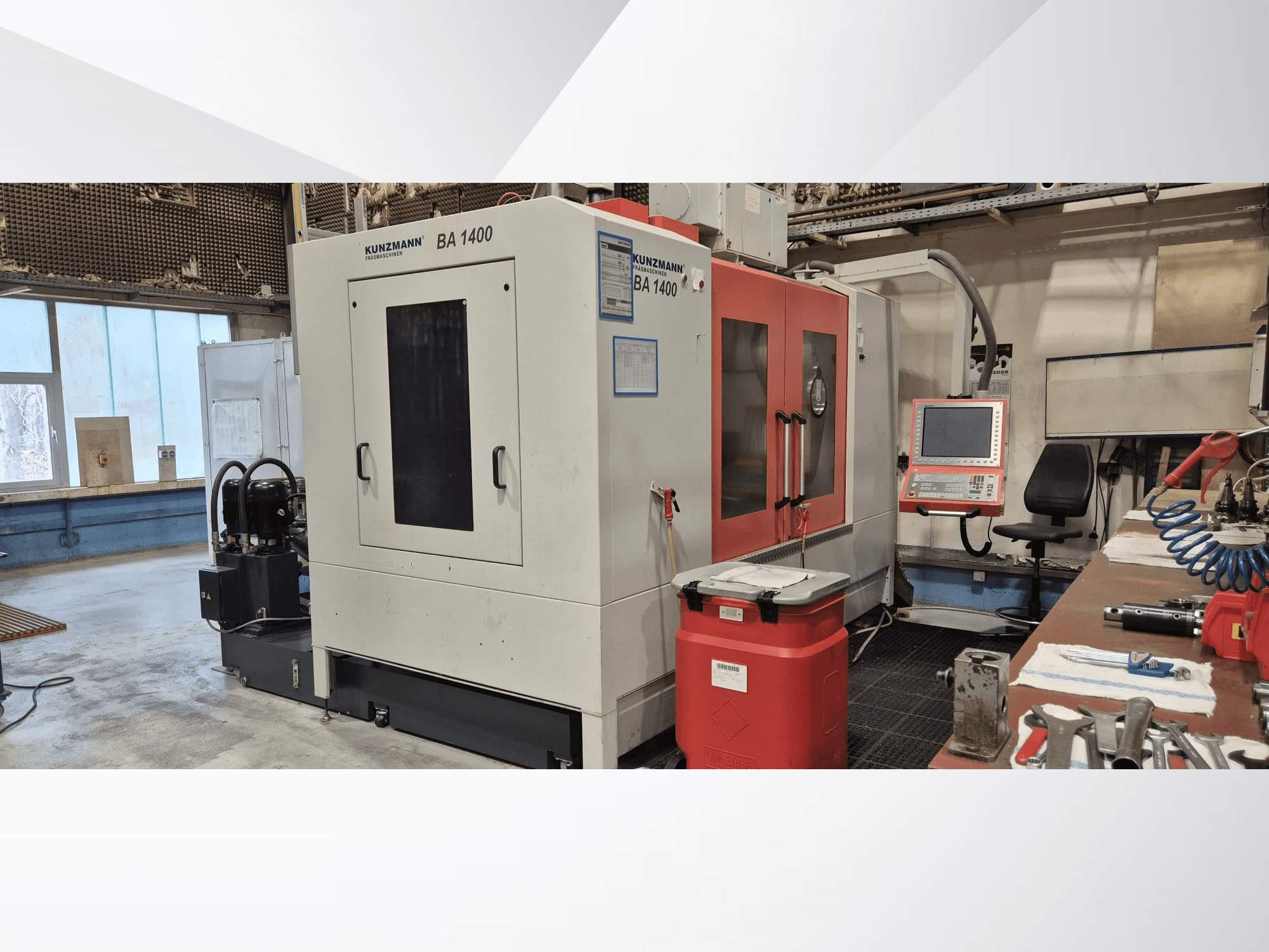 KUNZMANN BA1400 vertical machining centre in a workshop, side view showing control panel and surrounding tools.
