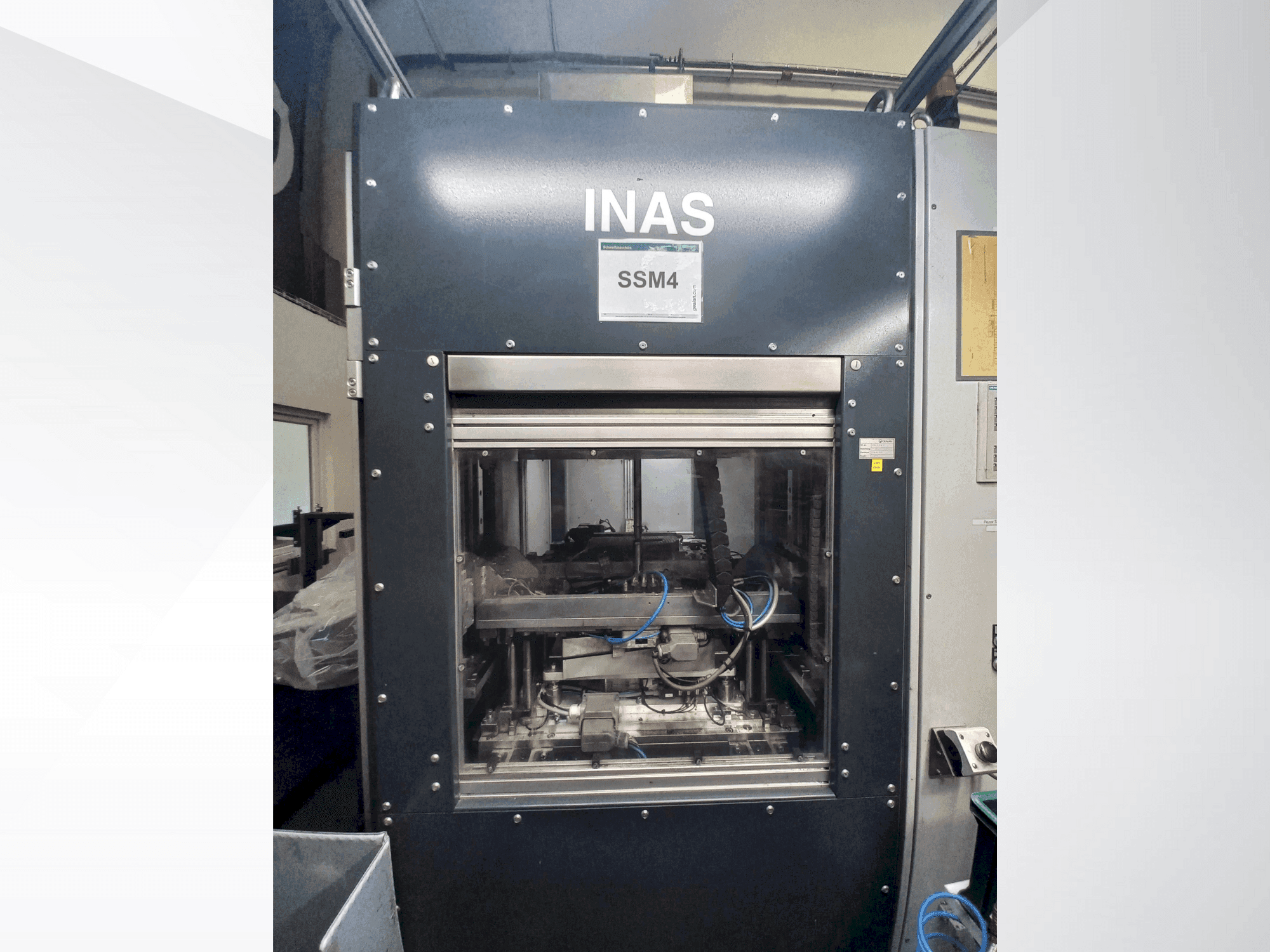 Front view of INAS VSM 210 machine