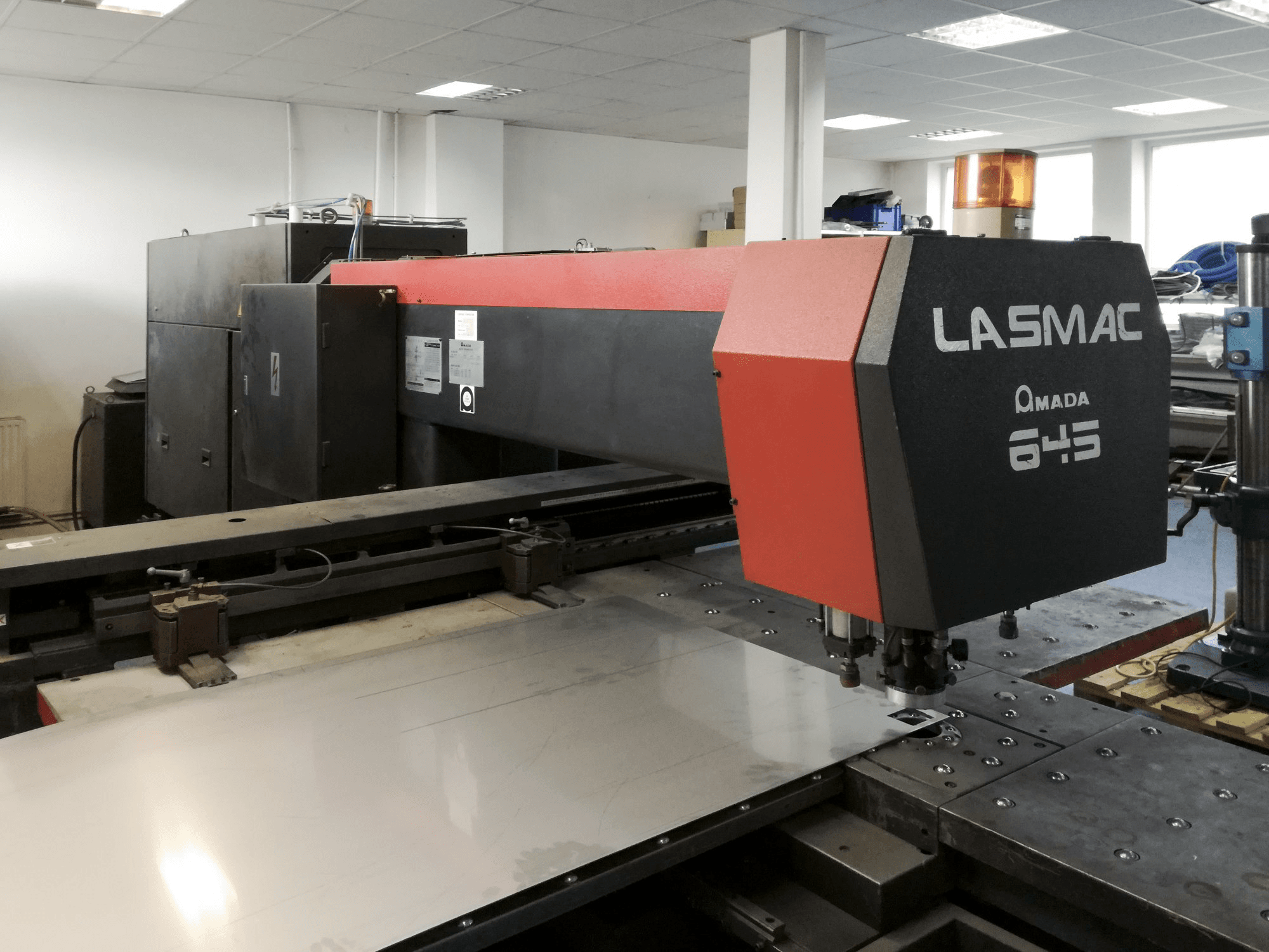 Left view of AMADA LCE 645 Machine
