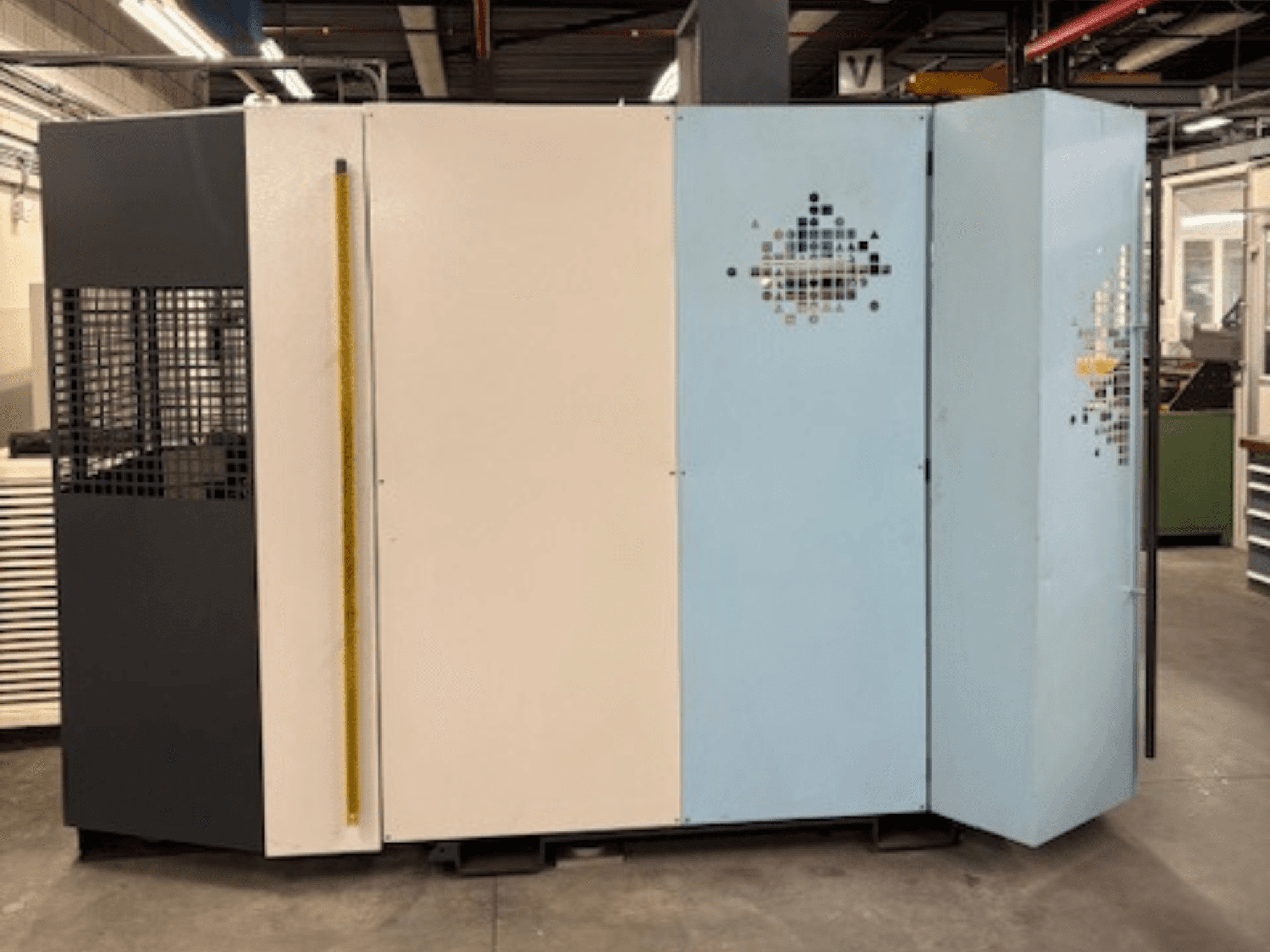 Wire EDM machine +GF+ AgieCharmilles AGIECUT PROGRESS V4, front view with multi-colored panels and safety grid.