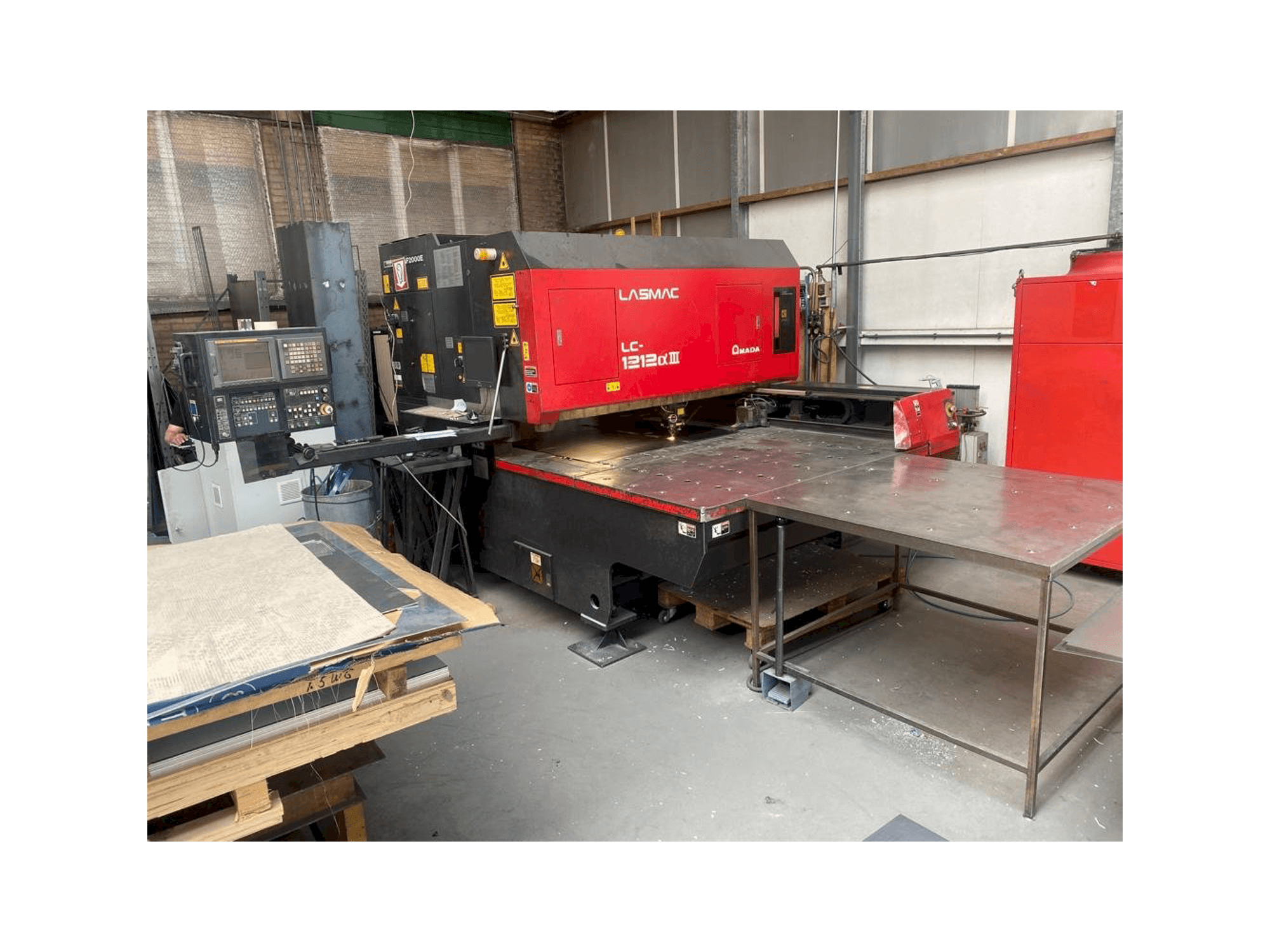 Front view of AMADA LC 1212 A3 machine
