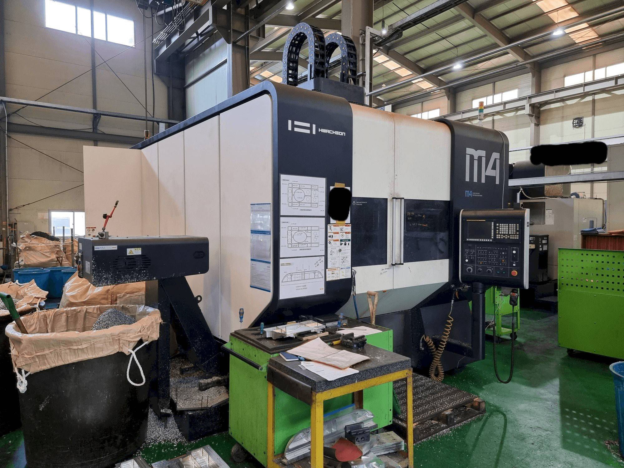 Front view of HWACHEON M4-5AX machine