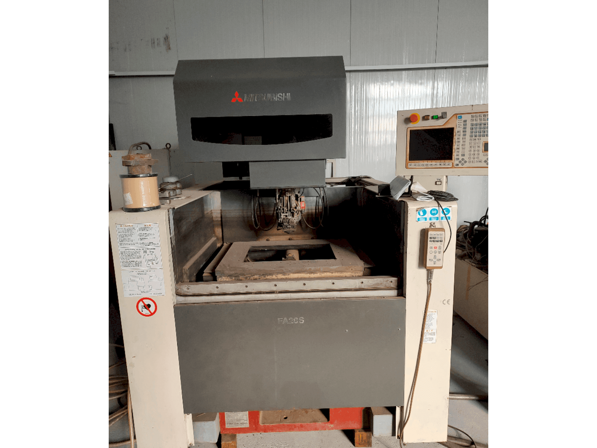 Front view of Mitsubishi FA20SM machine