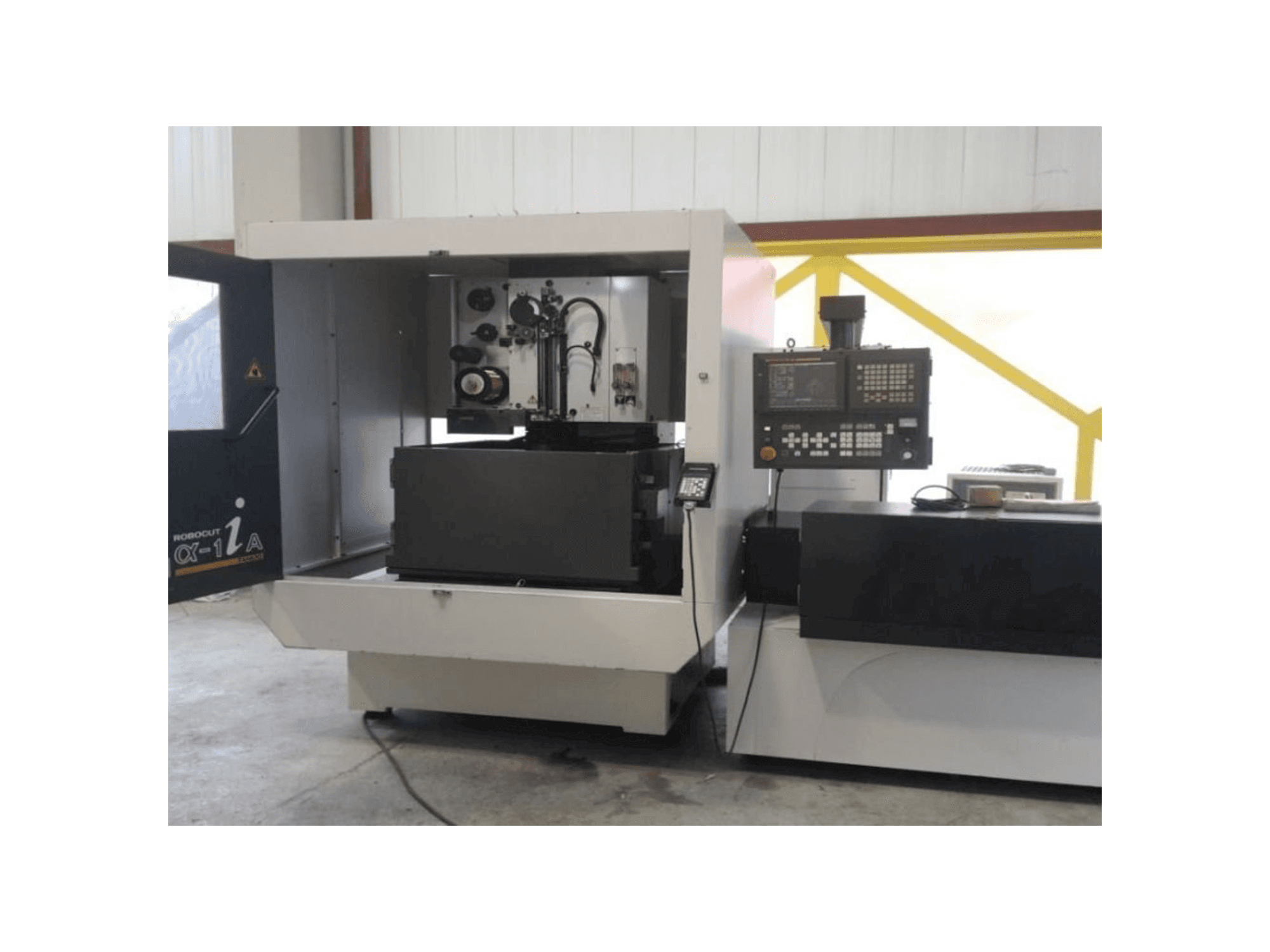 Front view of FANUC Robocut α-1iA machine