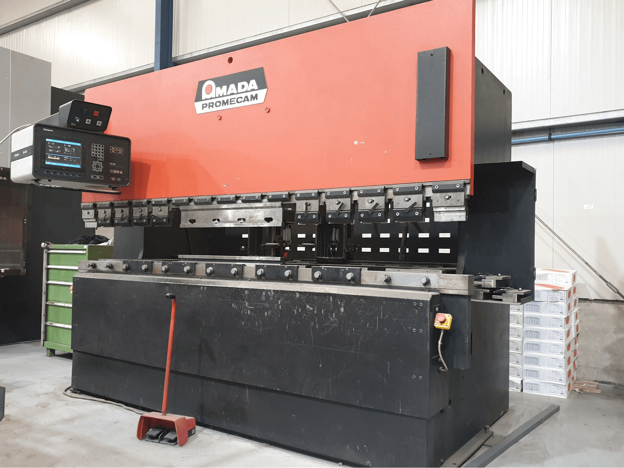 Left view of AMADA APX 3000 X 100 T Machine