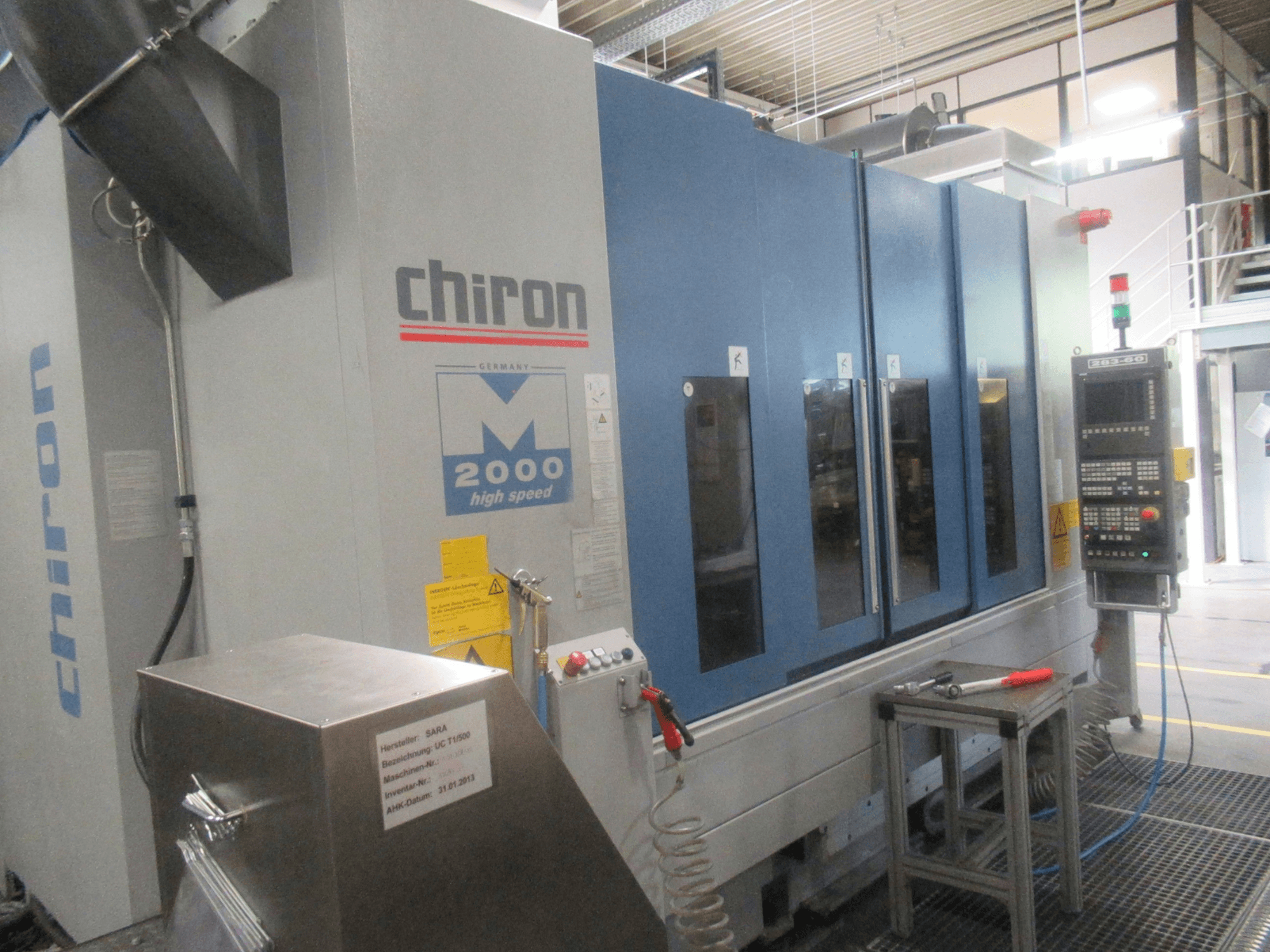 CHIRON Mill 2000 vertical machining centre, front view with control panel, blue design, and high-speed features visible.