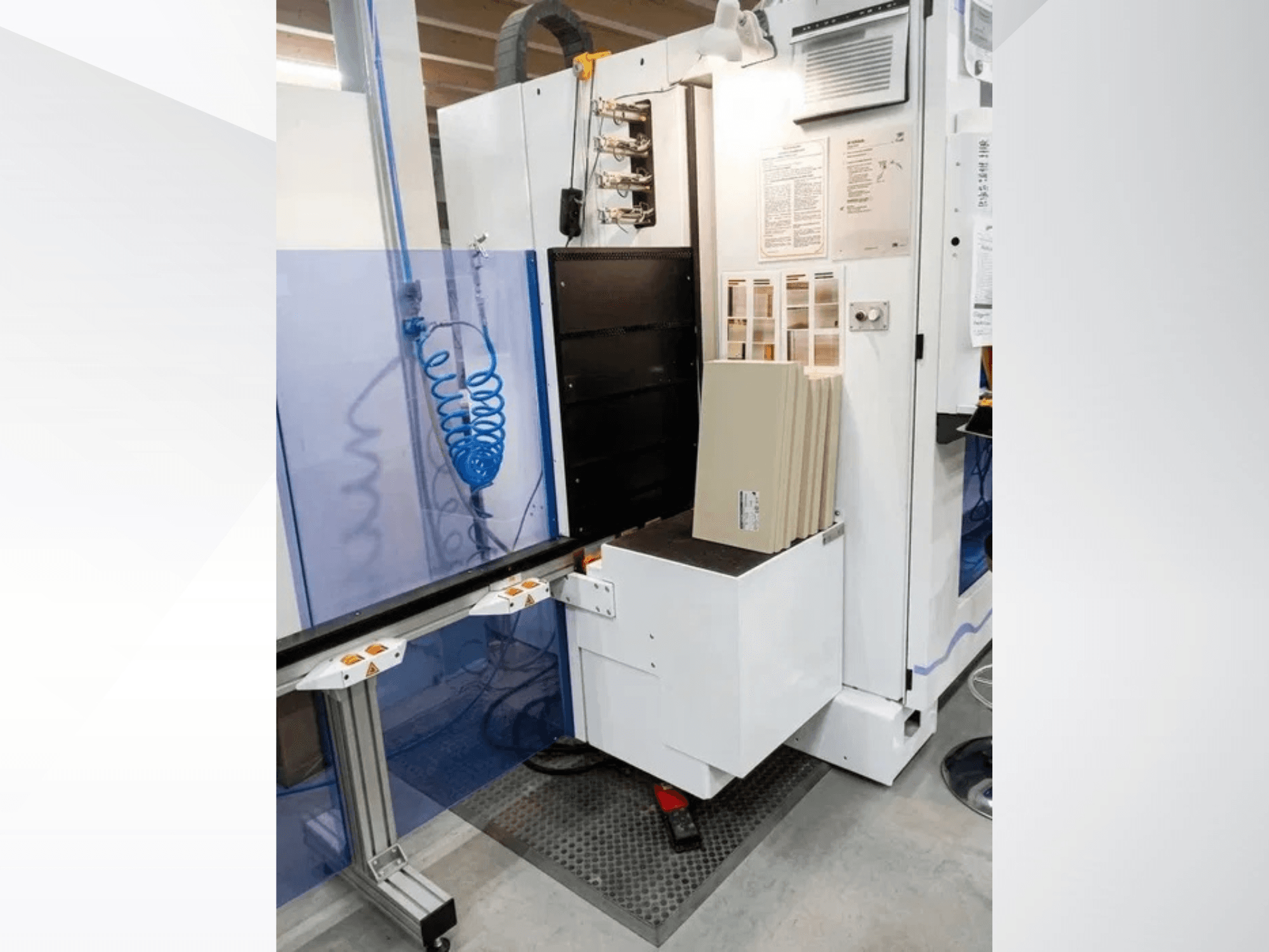 HOMAG OPTIMAT BHX 200 CNC Processing Center, front view showcasing control panel and material loading area.