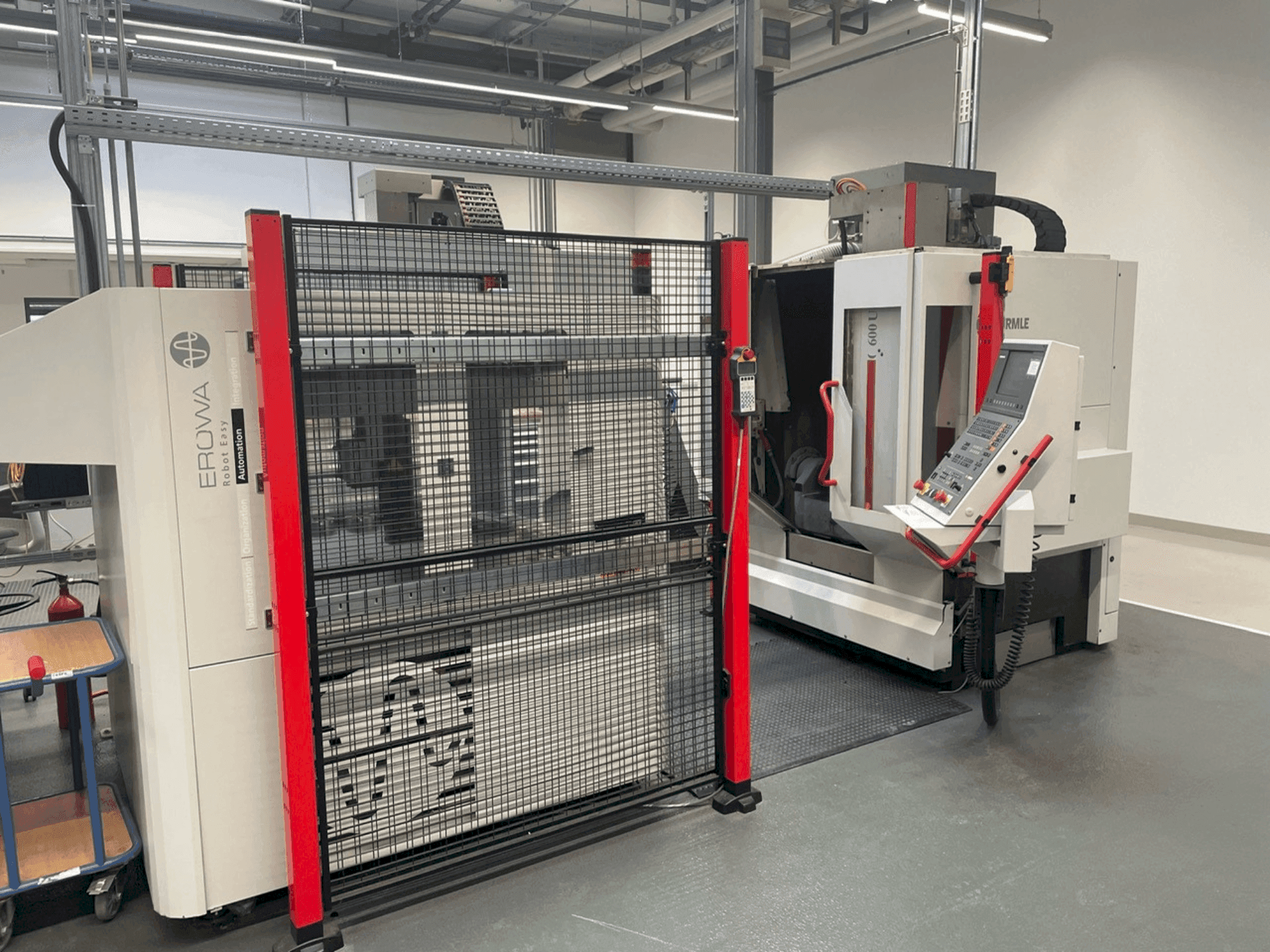 Front view of HERMLE C 600-U + EROWA Robot easy automation machine