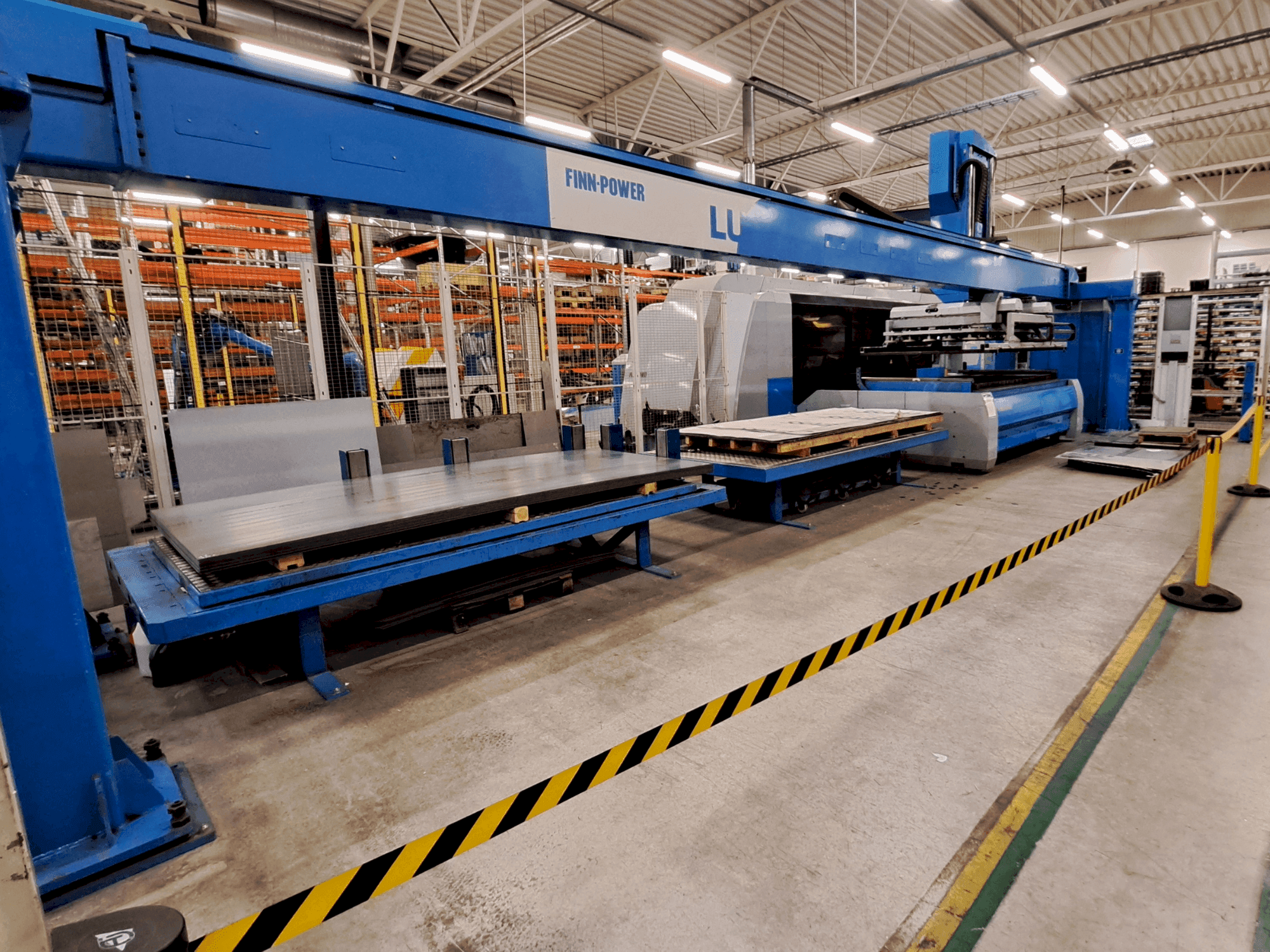 Front view of Finn-Power L6 laser + LU3000 machine