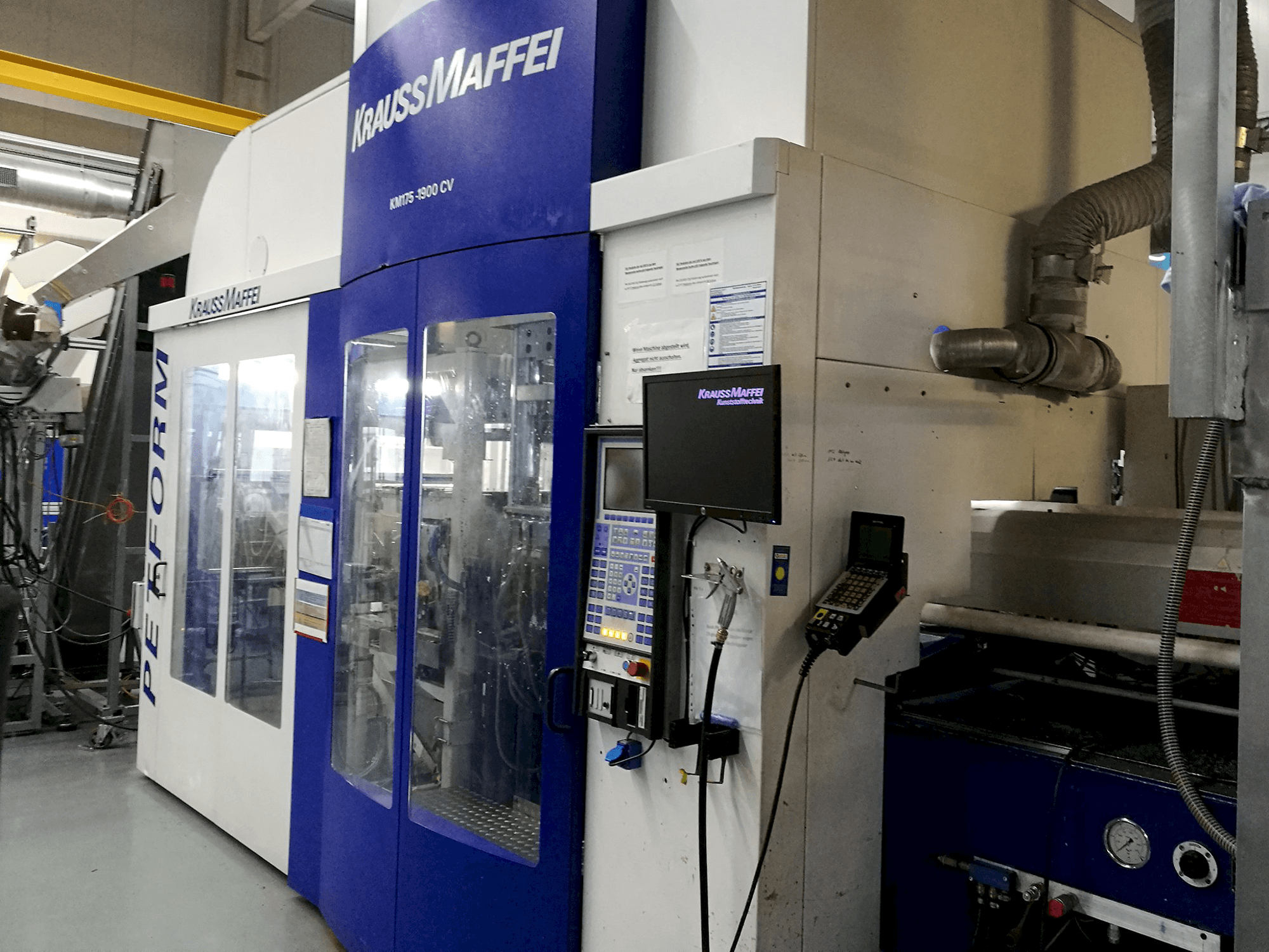 Right view of Krauss Maffei 175-1900 CV Machine