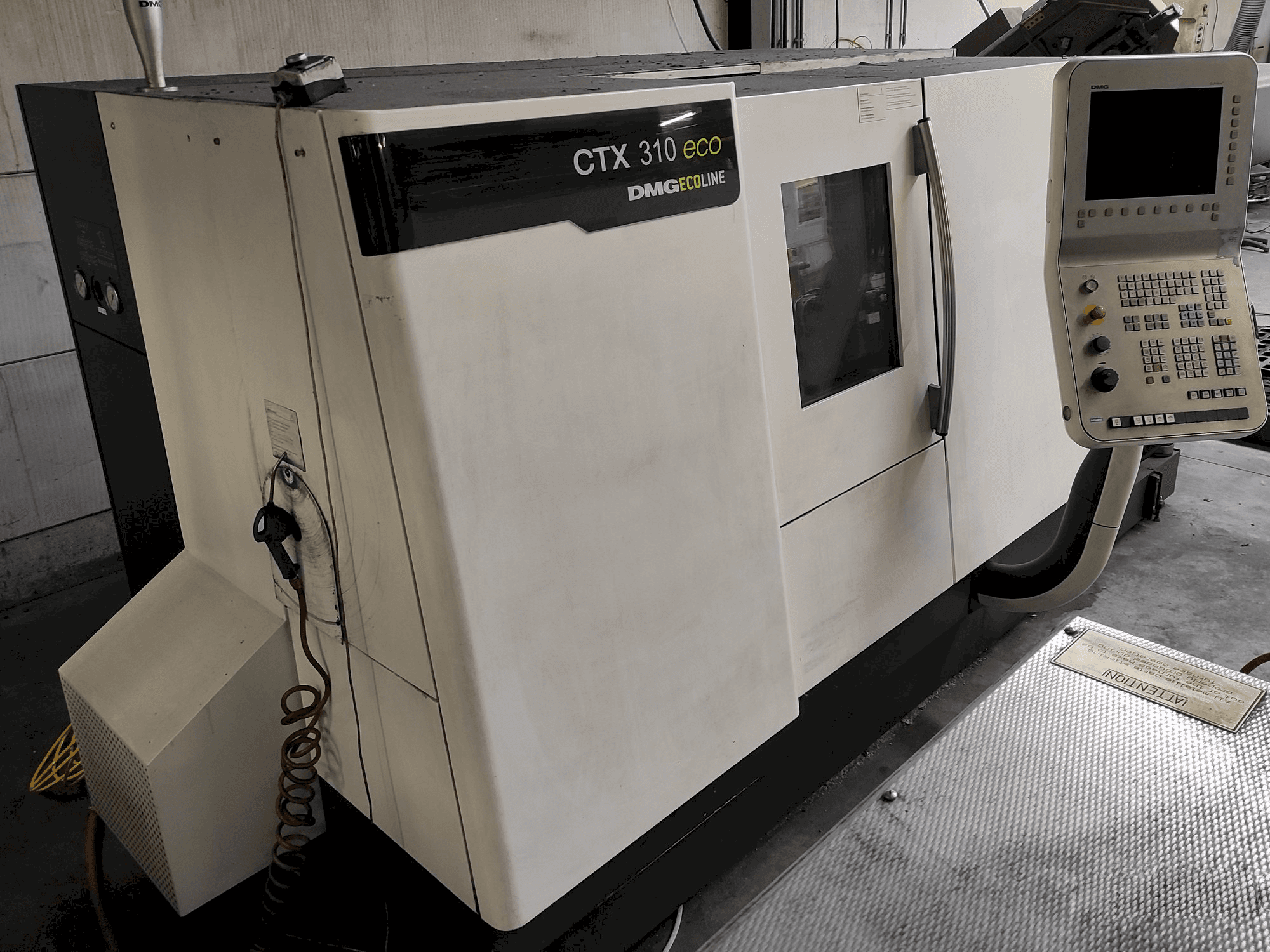 Front view of DMG GILDEMEISTER ecoline CTX310 eco machine