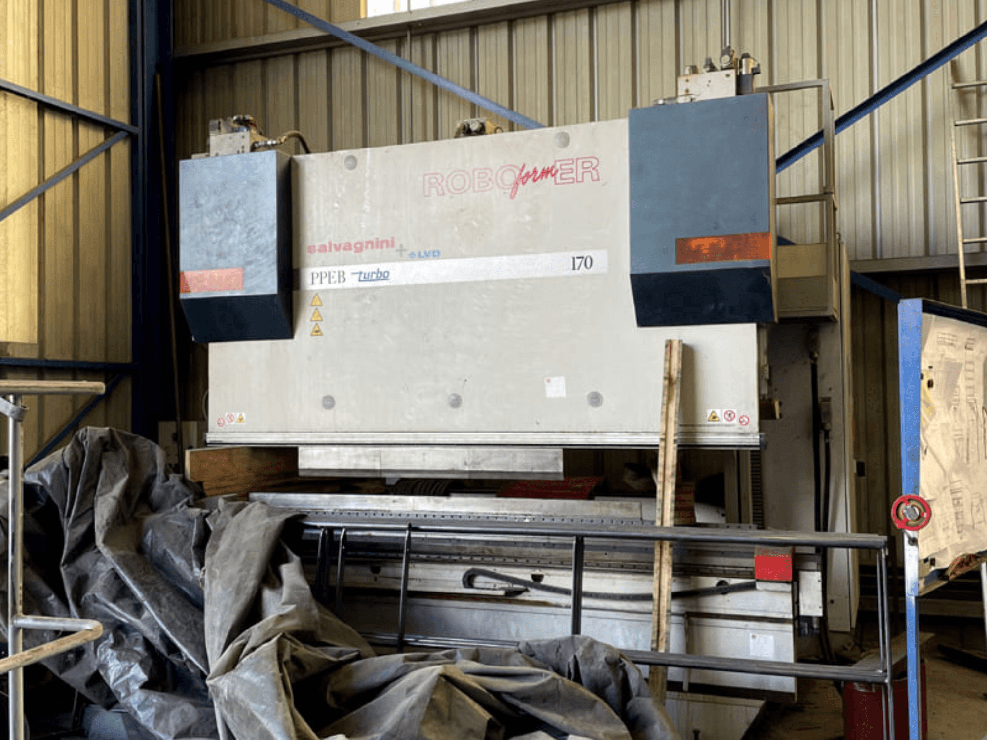 Press brake LVD PPEB 170/30 in a workshop setting, featuring a robust metal frame and industrial design. Front view.