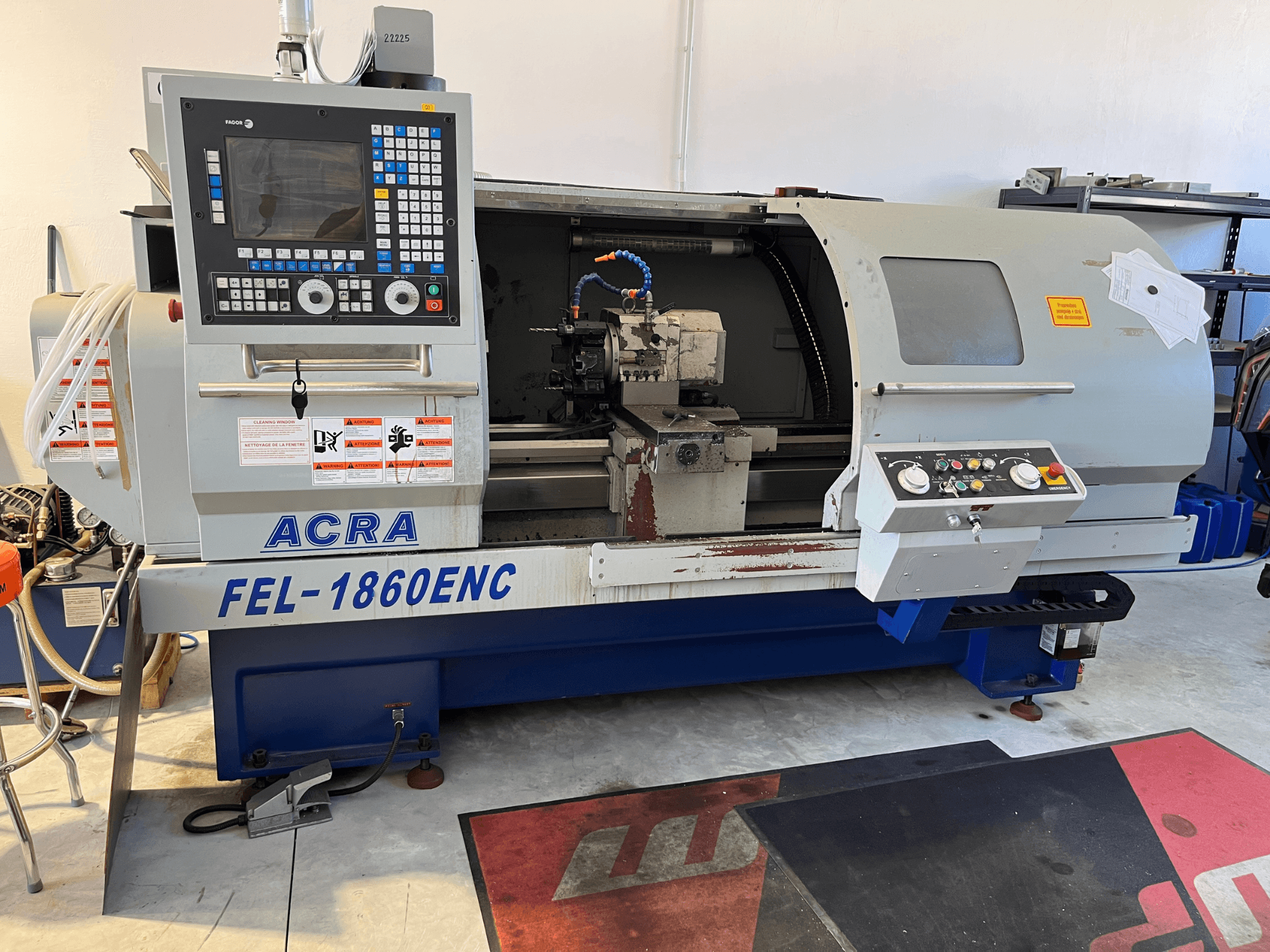 ACRA FEL-1860ENC/B horizontal turning machine, front view showing control panel and CNC components.