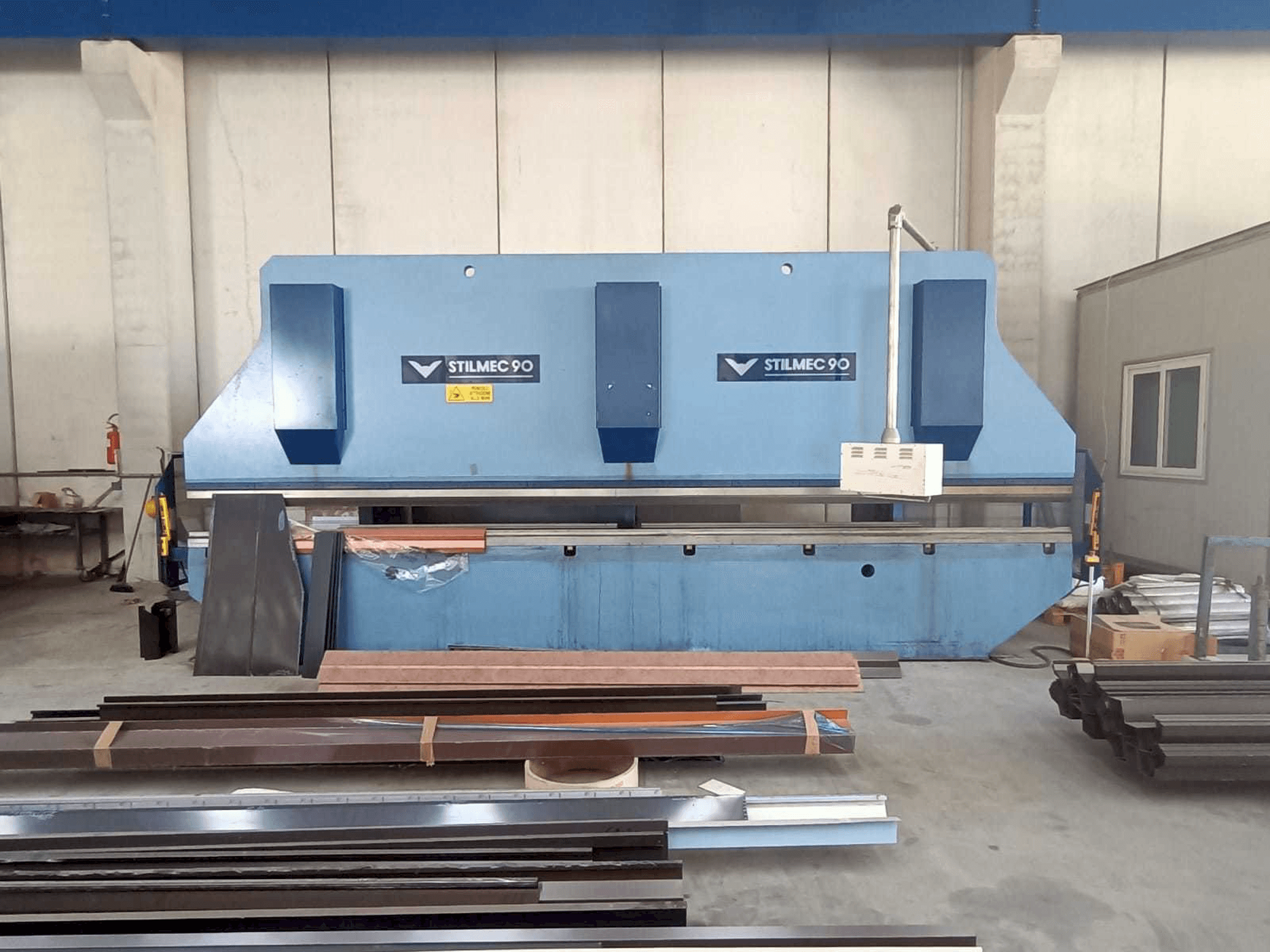 Front view of Stillmec 90 6500 x 200 ton machine