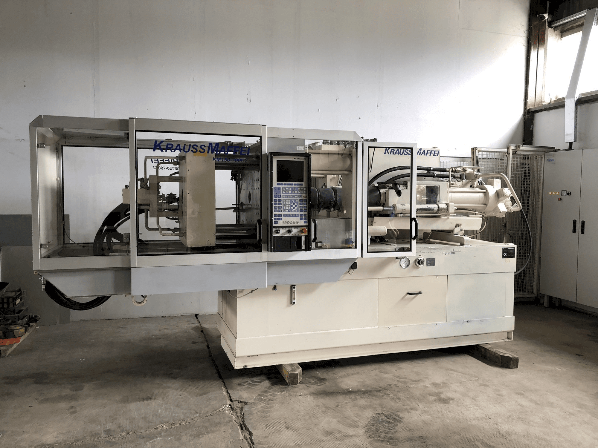 Front view of Krauss Maffei 150-700 C2 machine