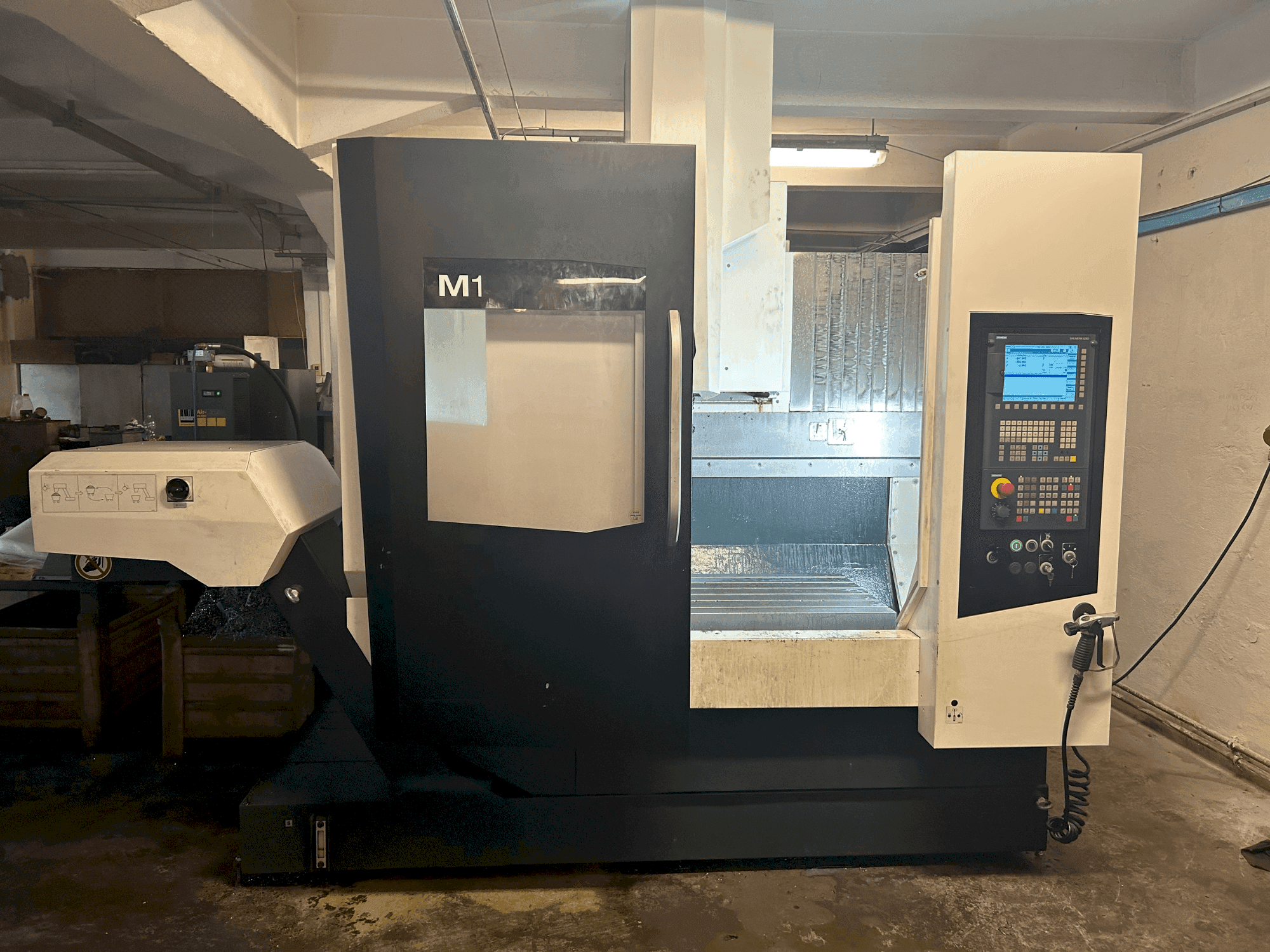 Front view of DMG MORI M1 machine