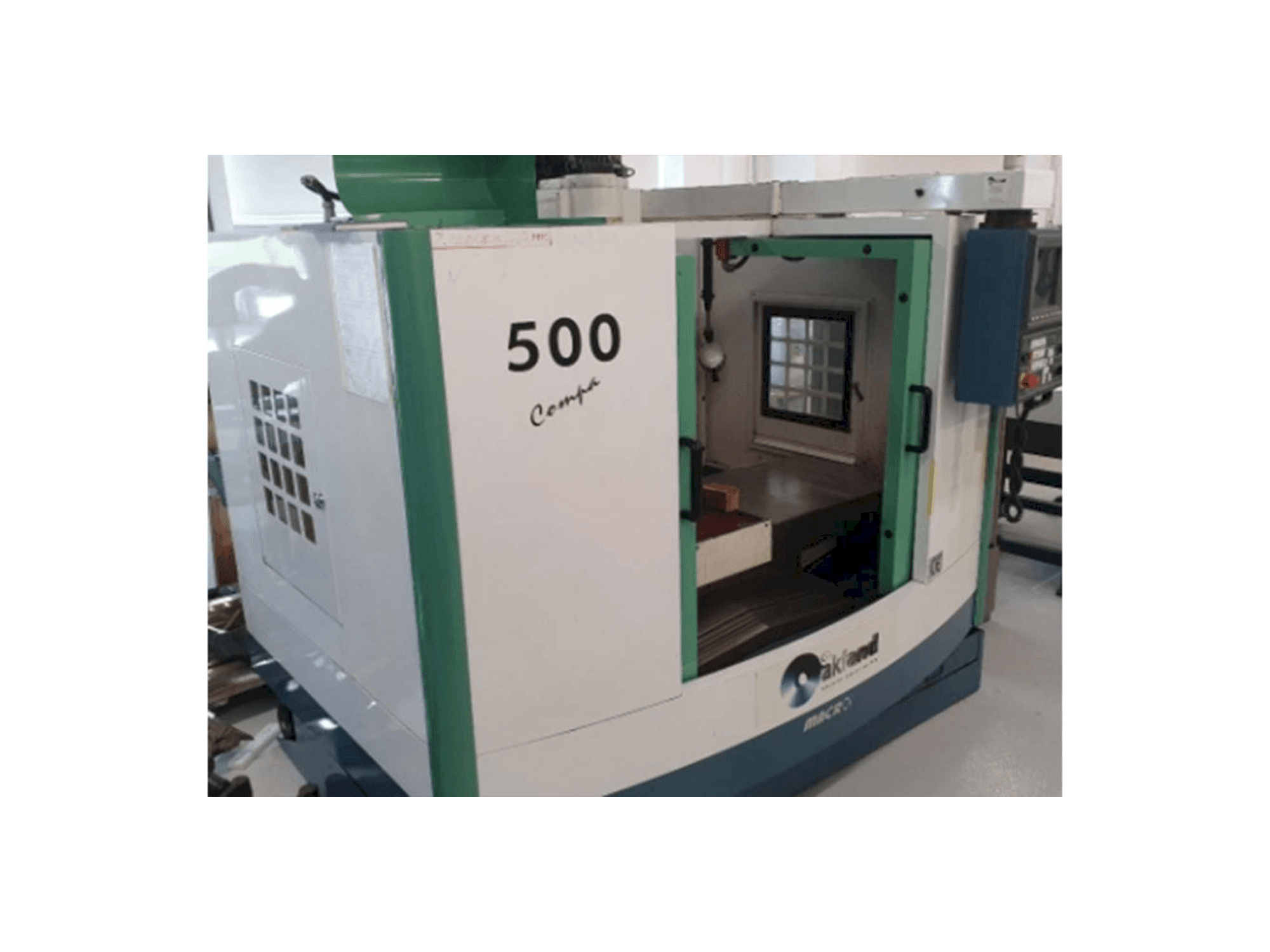 Front view of Macro Micro Tech Compac 500 machine