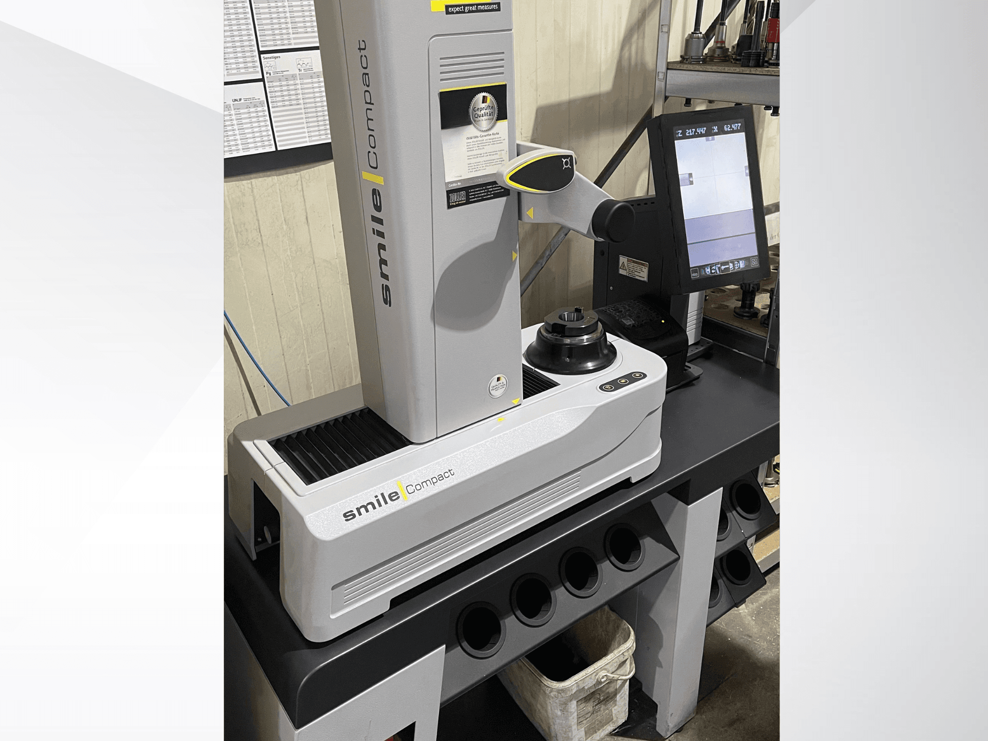 Zoller smileCompact machine tool in a front view, featuring a digital screen and precision measurement components.