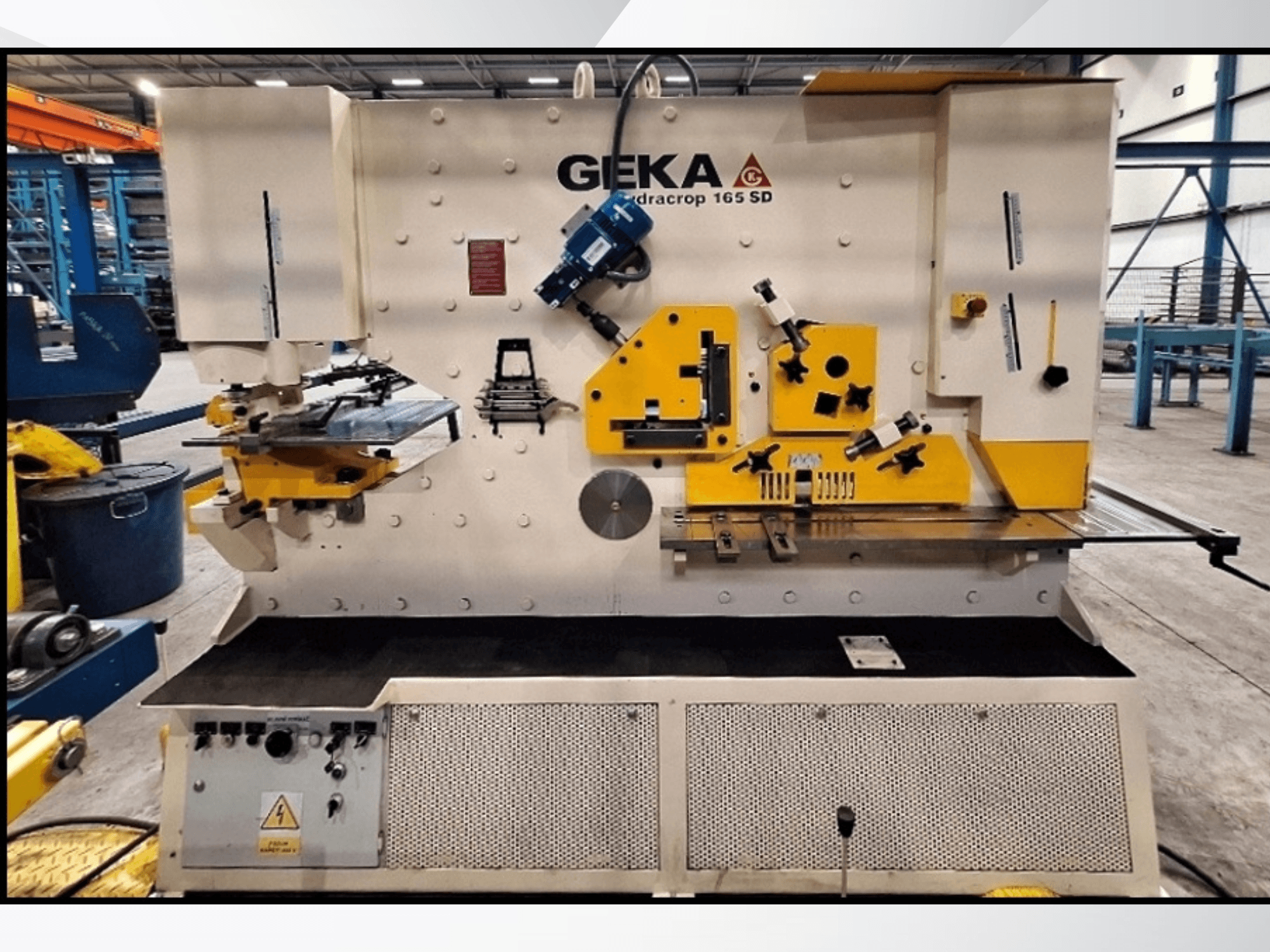 CNC shearing machine GEKA HYDRACROP 165/300 SD in front view, showcasing controls and cutting features.