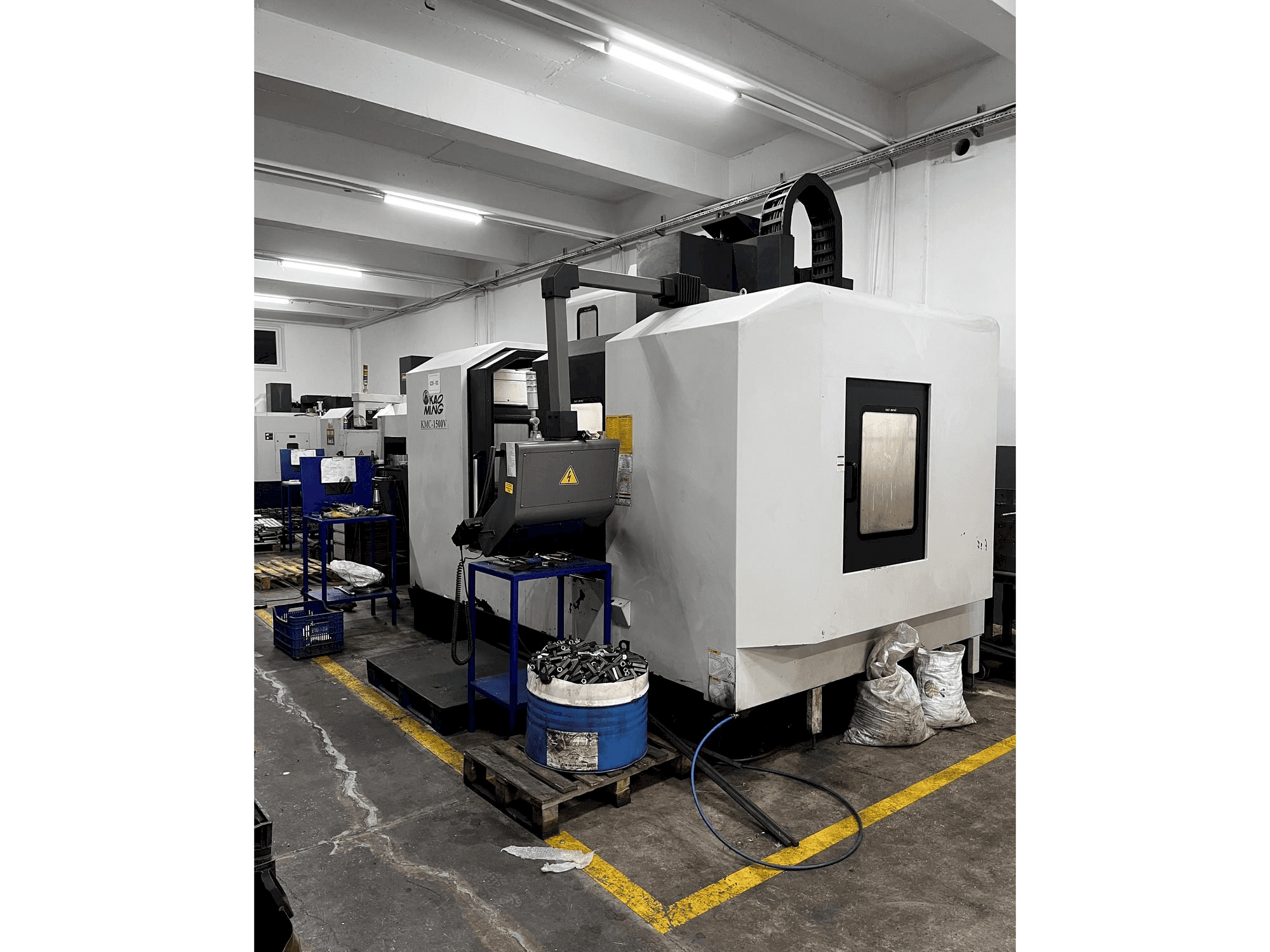 Front view of KAOMING KMC 1500V machine