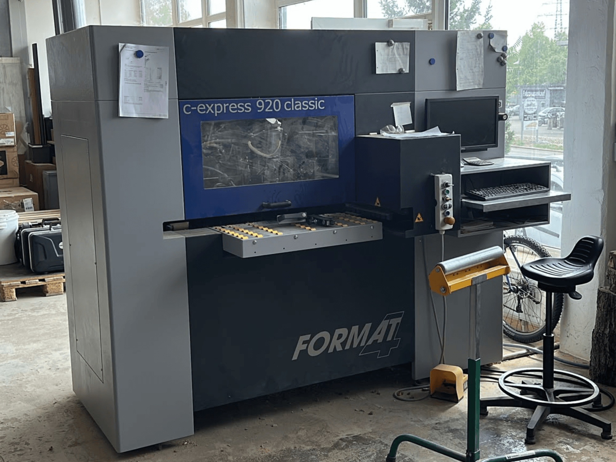 CNC wood machining center FORMAT4 c-express 920 classic, front view showcasing control panel and workspace.