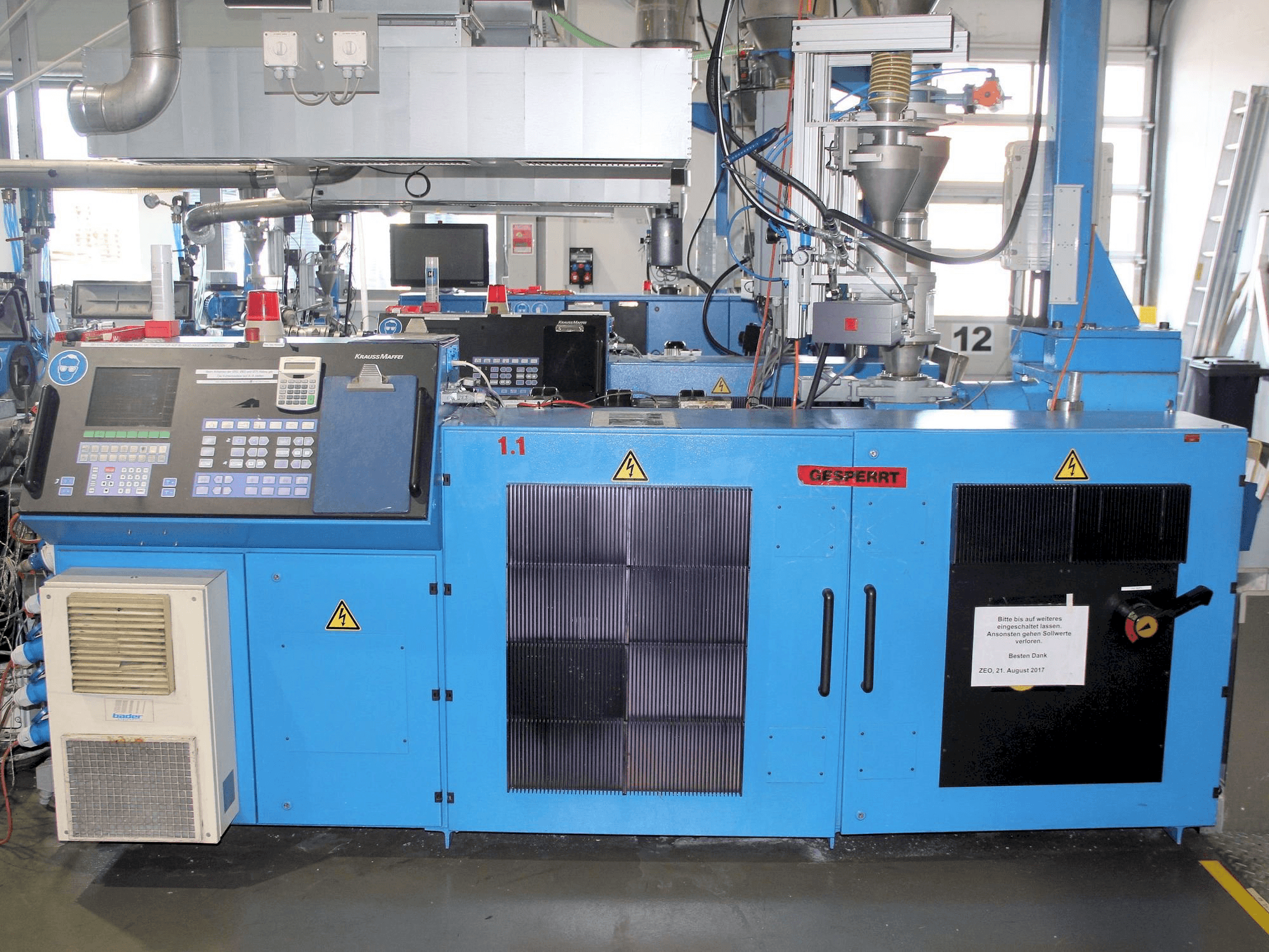 Front view of Krauss Maffei KME 1-75-30 B machine