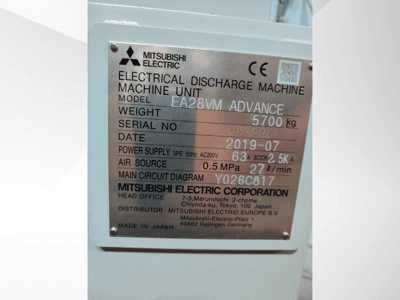 Mitsubishi Electric EA28VM Advance electrical discharge machine label, featuring specifications like weight, power supply, and air source.