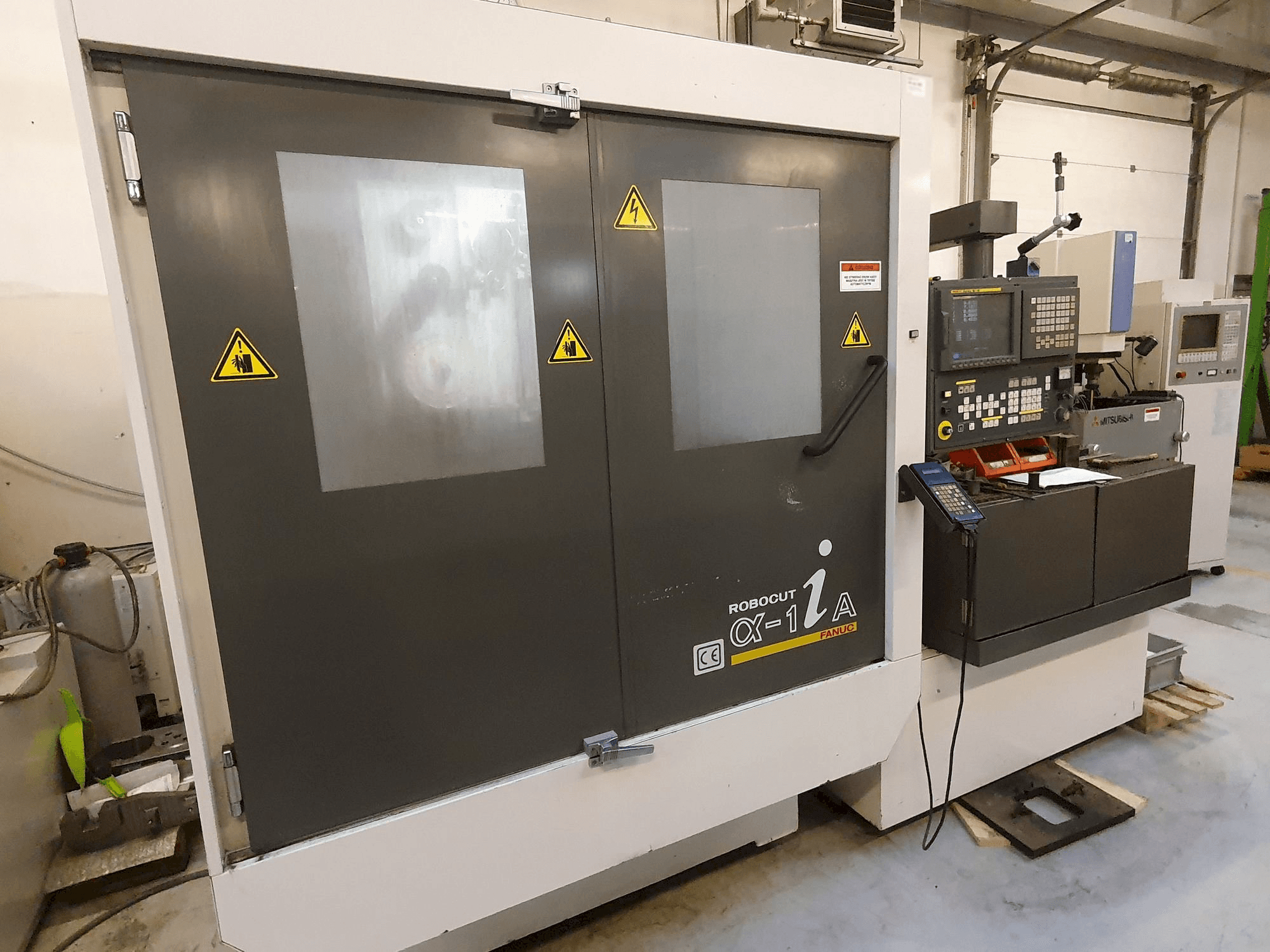 Front view of FANUC Robocut Alpha-1iA machine