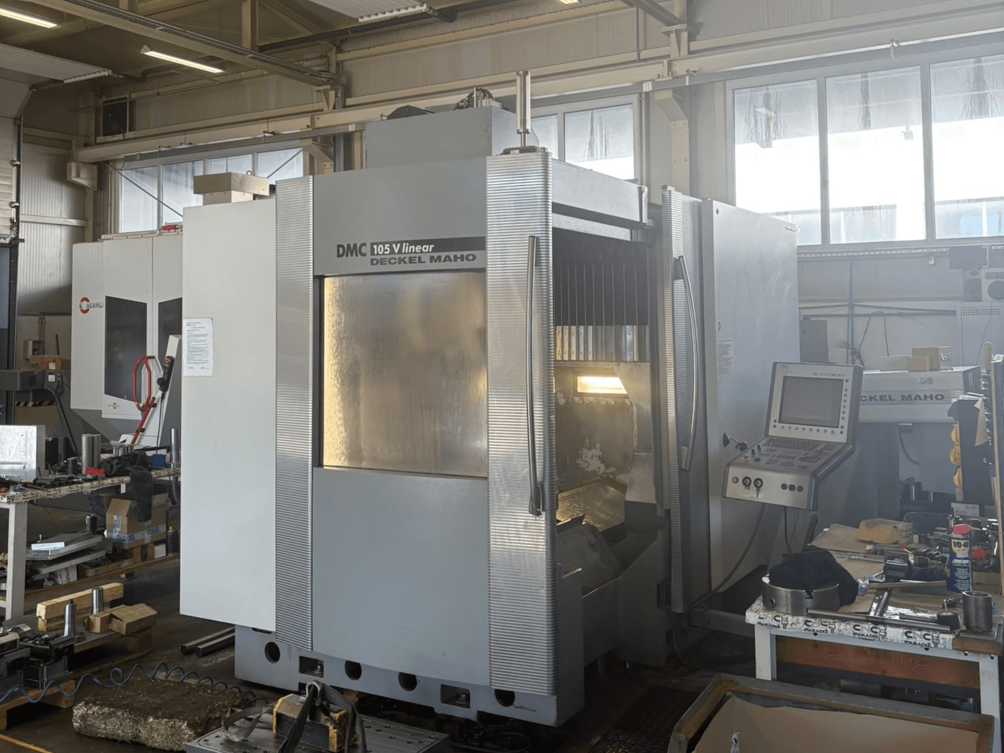 DMG DECKEL MAHO DMU 105 V Linear vertical machining center, front view showing control panel and work area.