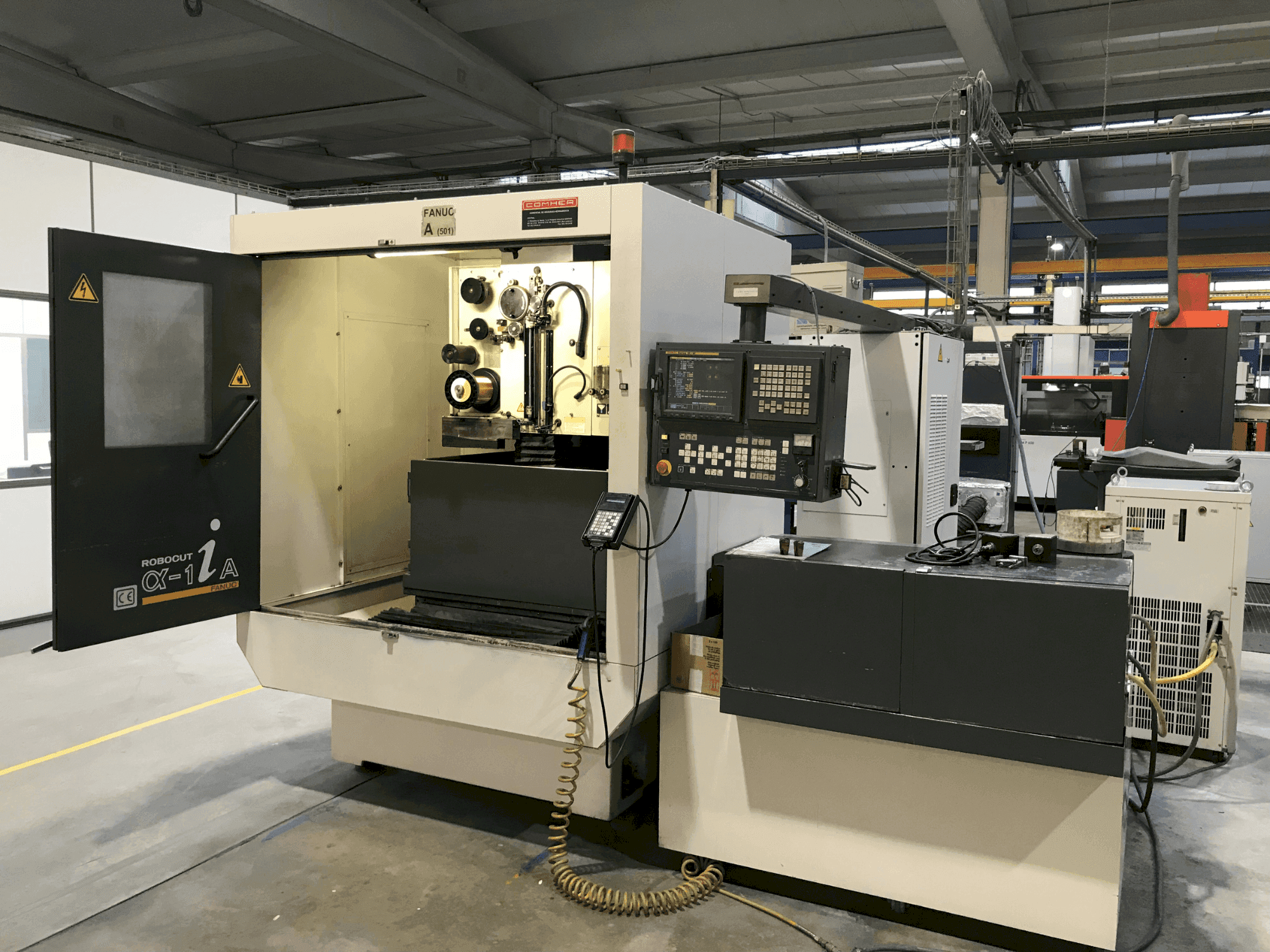 Front view of FANUC ROBOCUT α-1iA machine