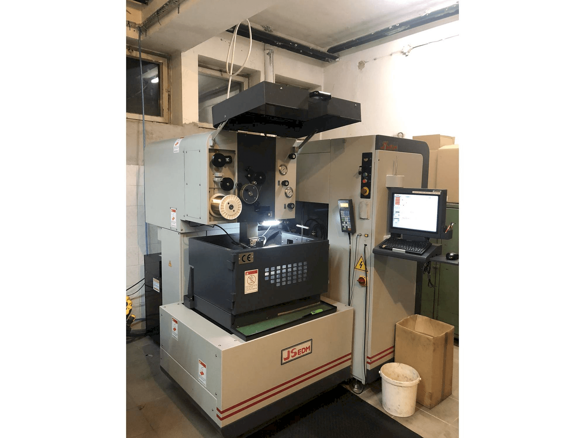 Front view of JS EDM Wi-200s machine